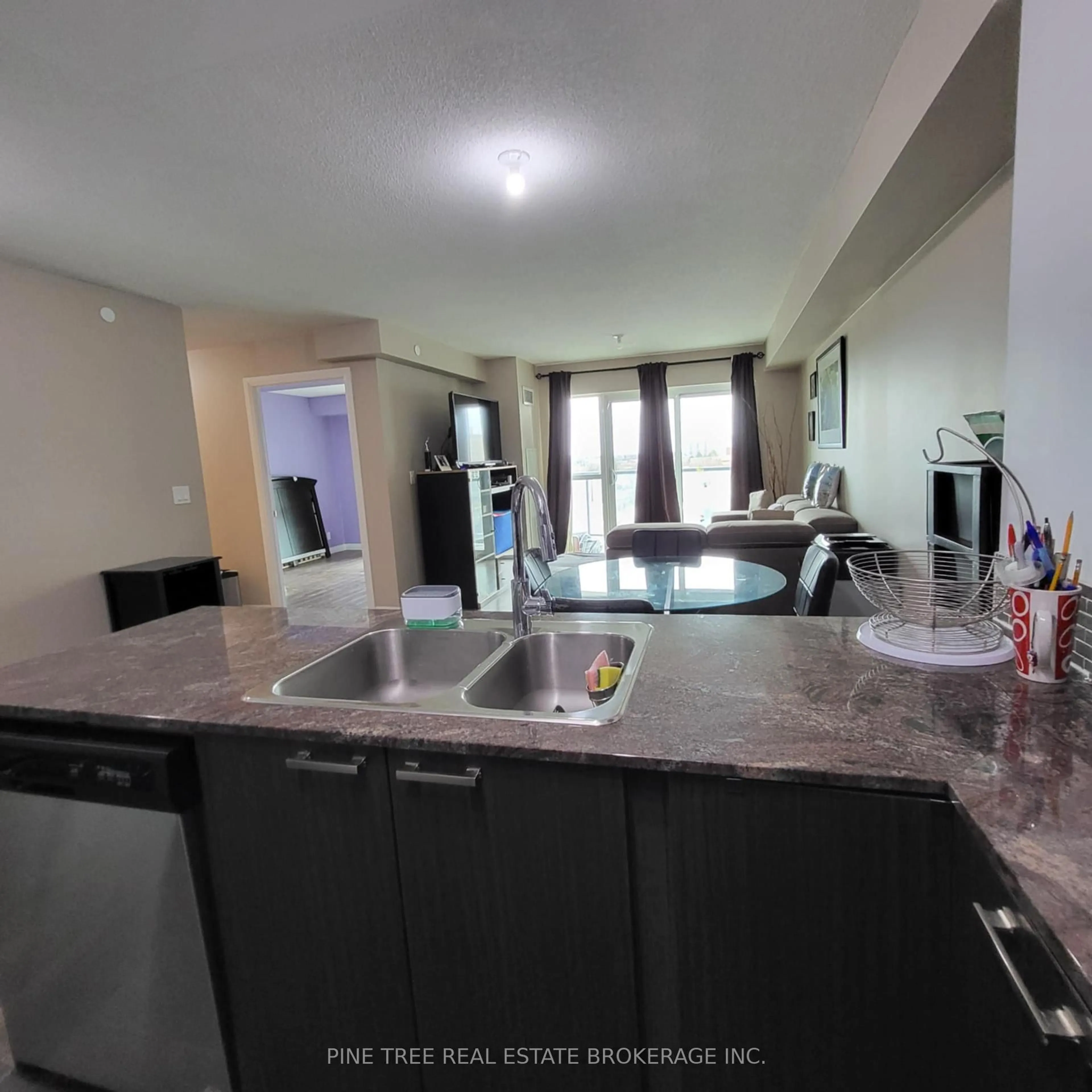 Open concept kitchen, unknown for 2150 Lawrence Ave #701, Toronto Ontario M1R 3A7