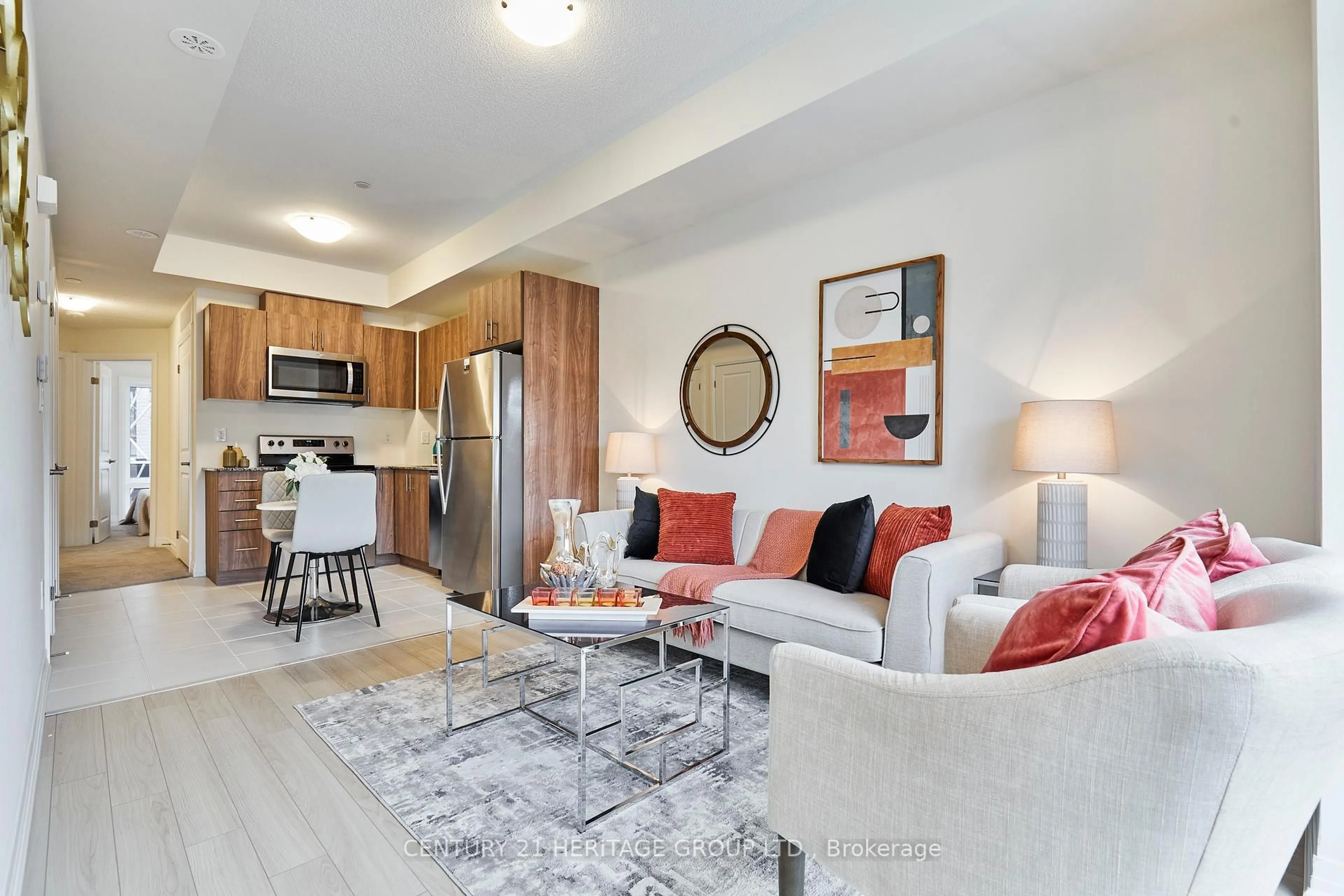 Living room with furniture, unknown for 145 Tapscott Rd #10, Toronto Ontario M1B 1E7