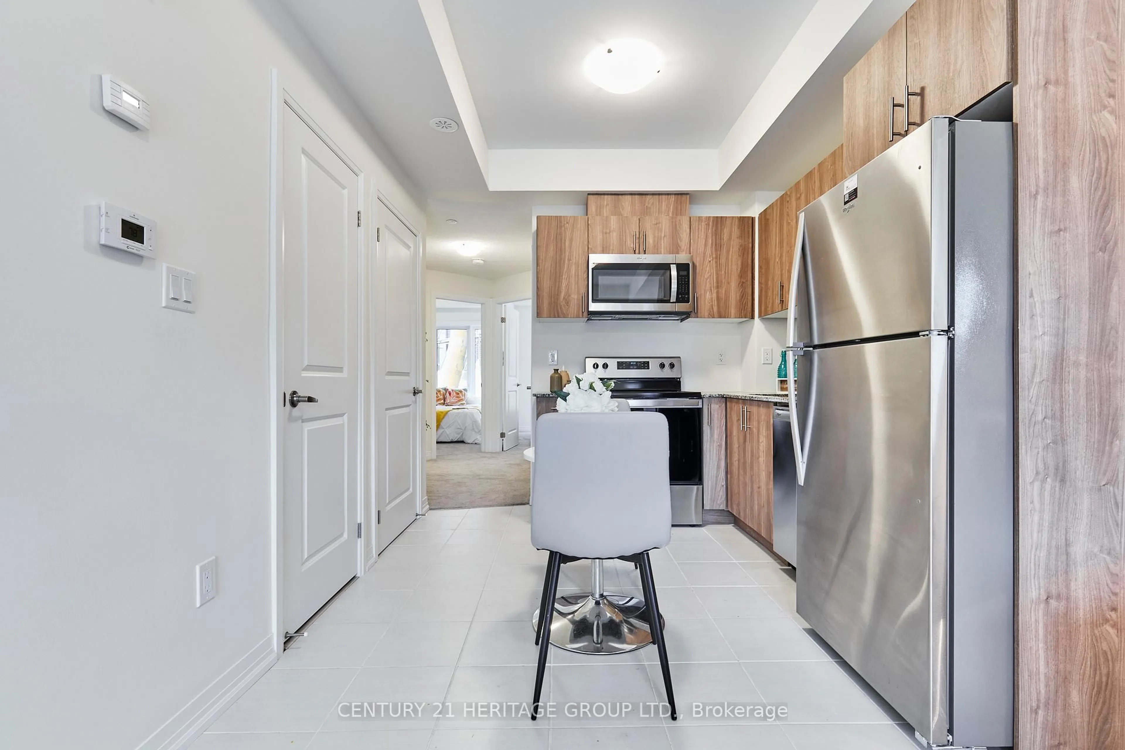 Standard kitchen, ceramic/tile floor for 145 Tapscott Rd #10, Toronto Ontario M1B 1E7