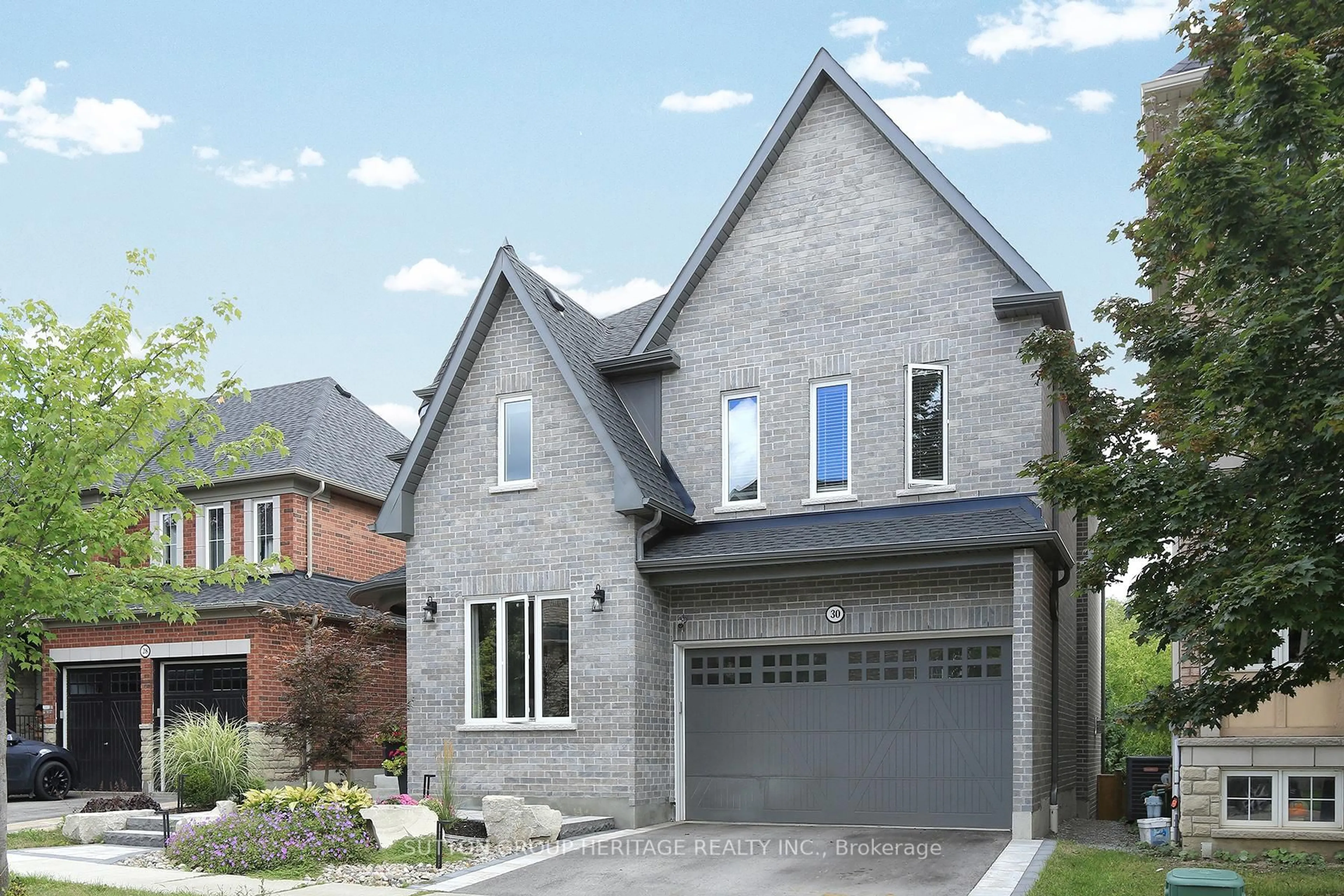 Home with brick exterior material, street for 30 Hunwicks Cres, Ajax Ontario L1Z 0E4