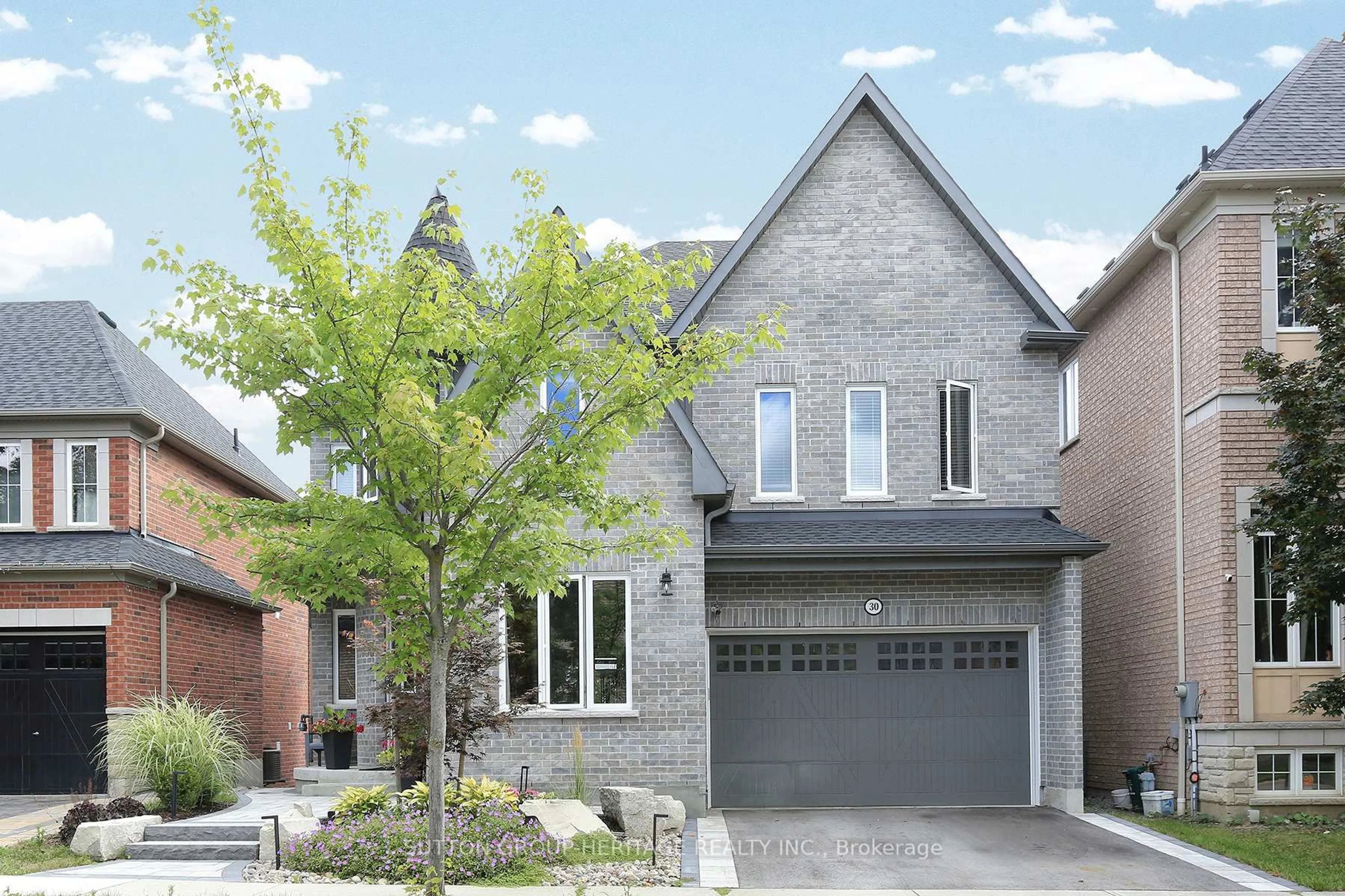 Home with brick exterior material, street for 30 Hunwicks Cres, Ajax Ontario L1Z 0E4