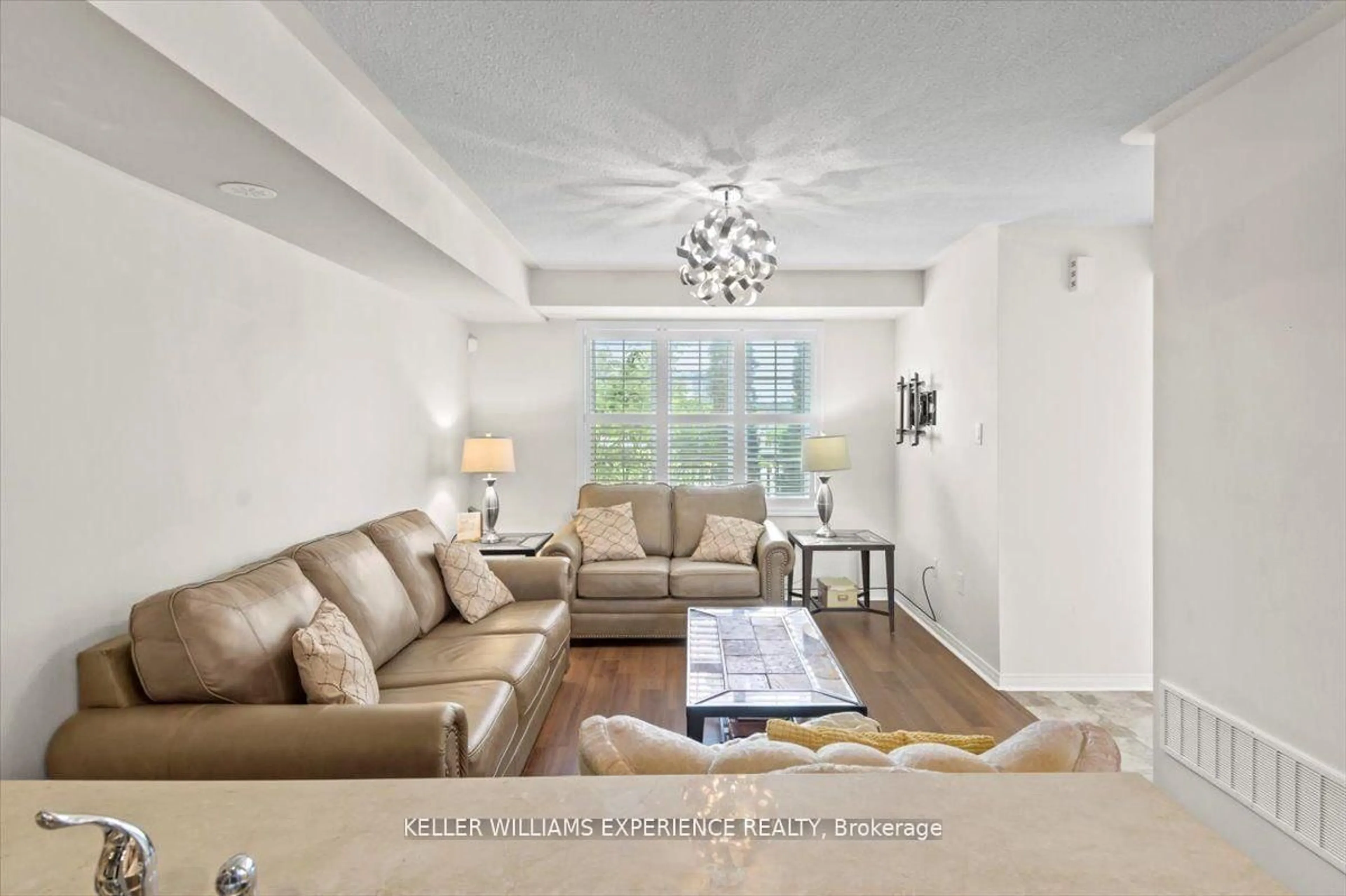 Living room with furniture, unknown for 113 Chapman Dr #11, Ajax Ontario L1T 0C1