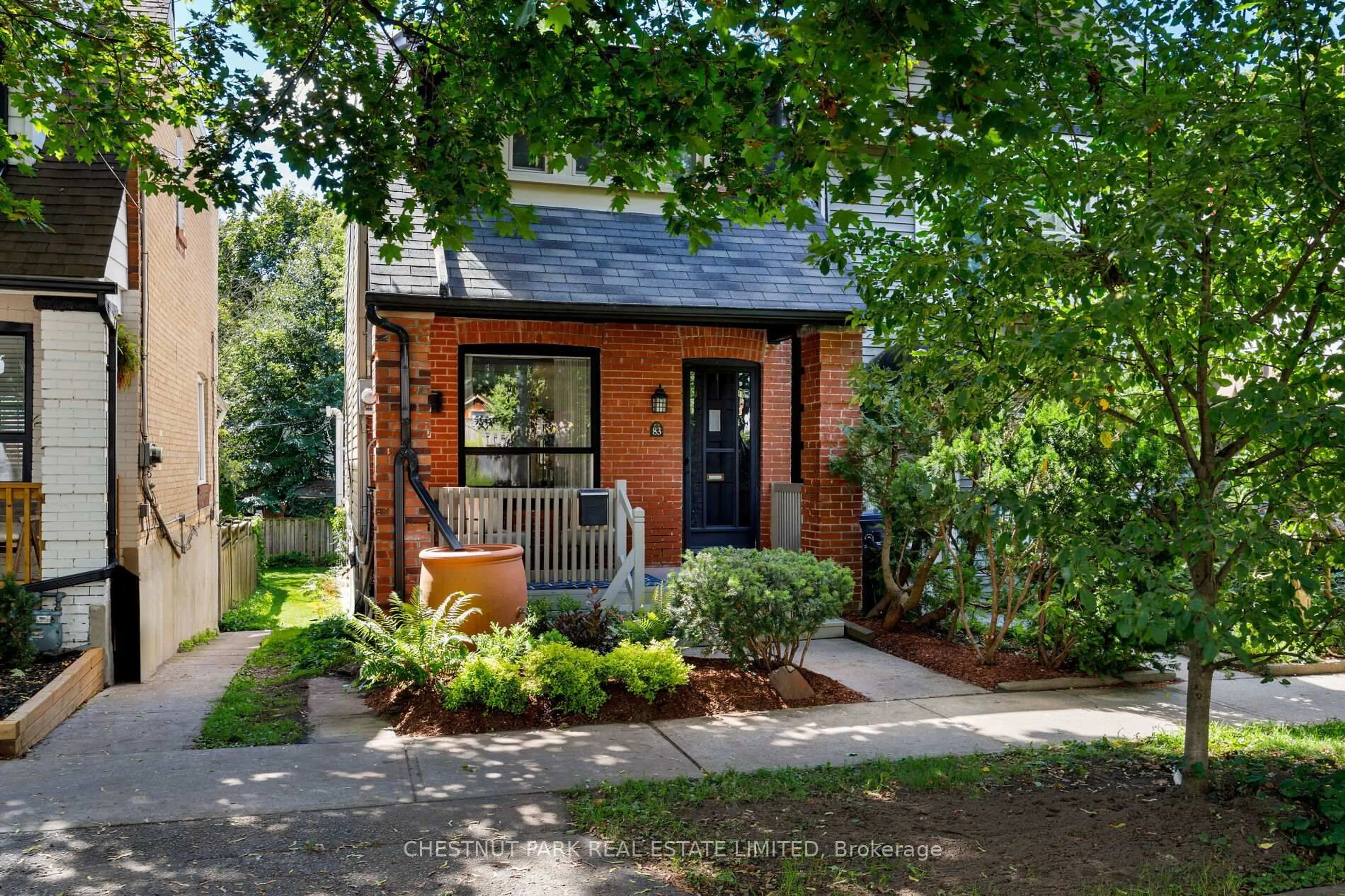 Home with brick exterior material, street for 83 Merrill Ave, Toronto Ontario M4C 1C6