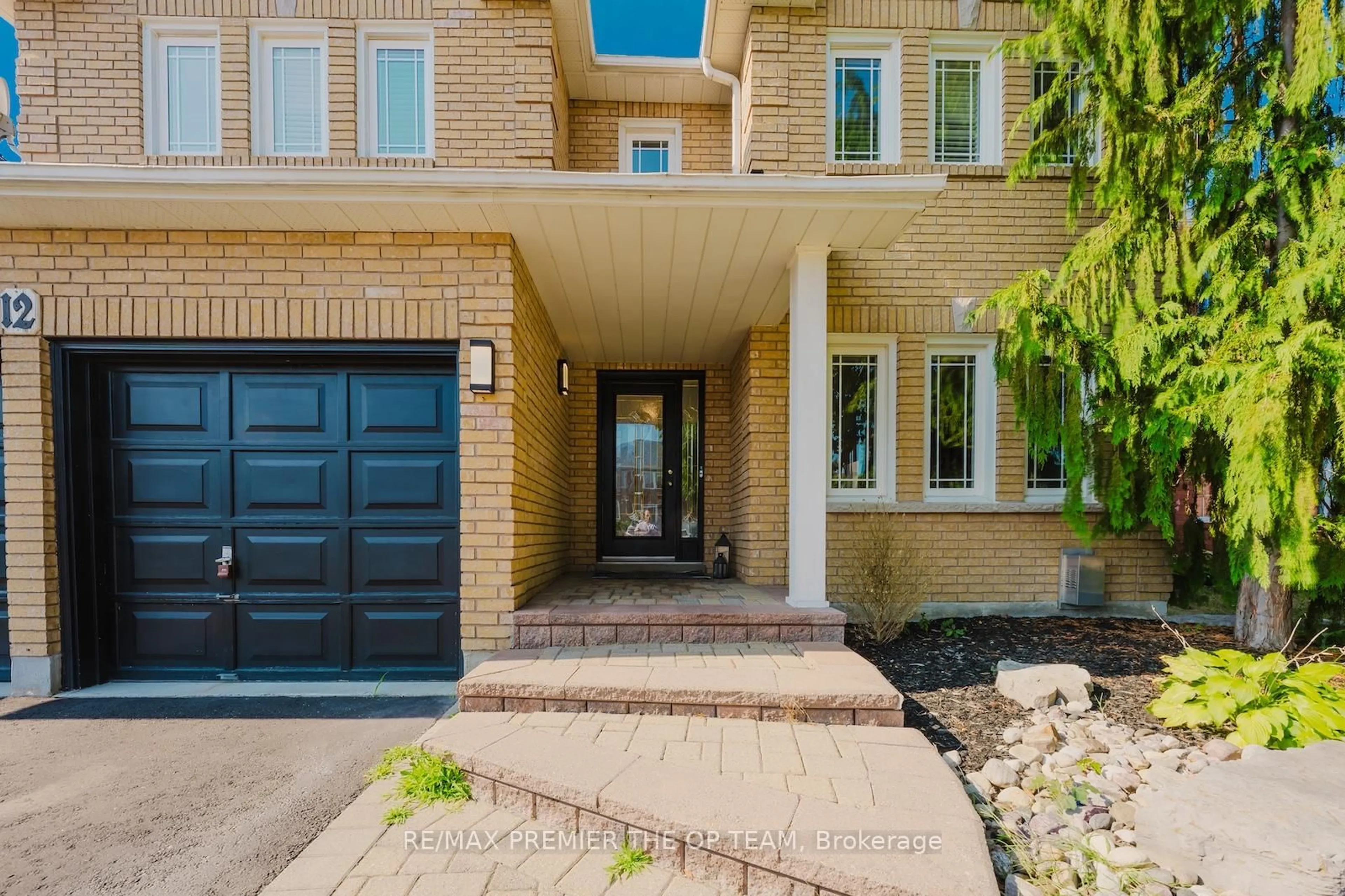 Home with brick exterior material, street for 12 Donald Wilson St, Whitby Ontario L1R 2H5