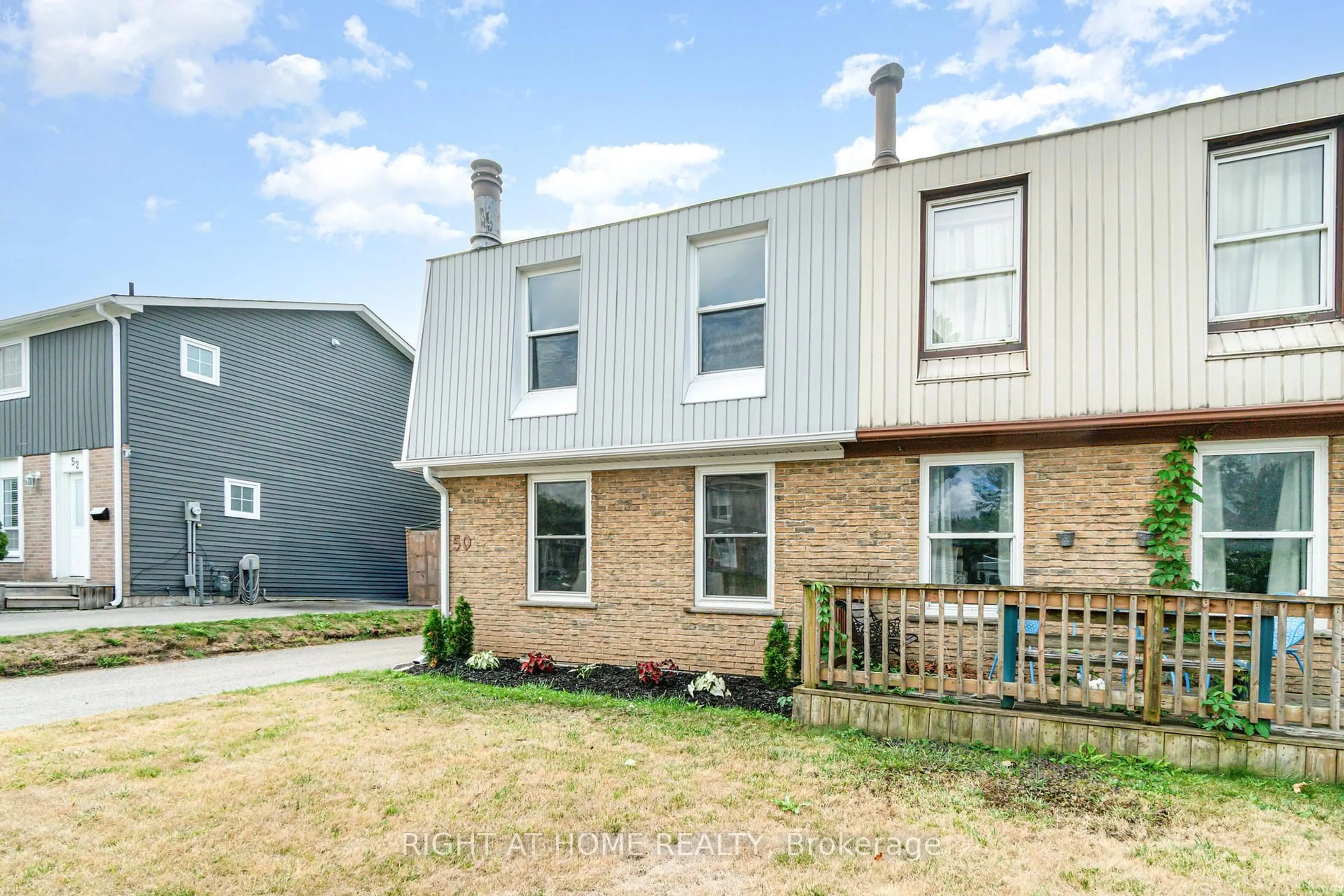 Home with brick exterior material, street for 50 Roser Cres, Clarington Ontario L1C 3N8