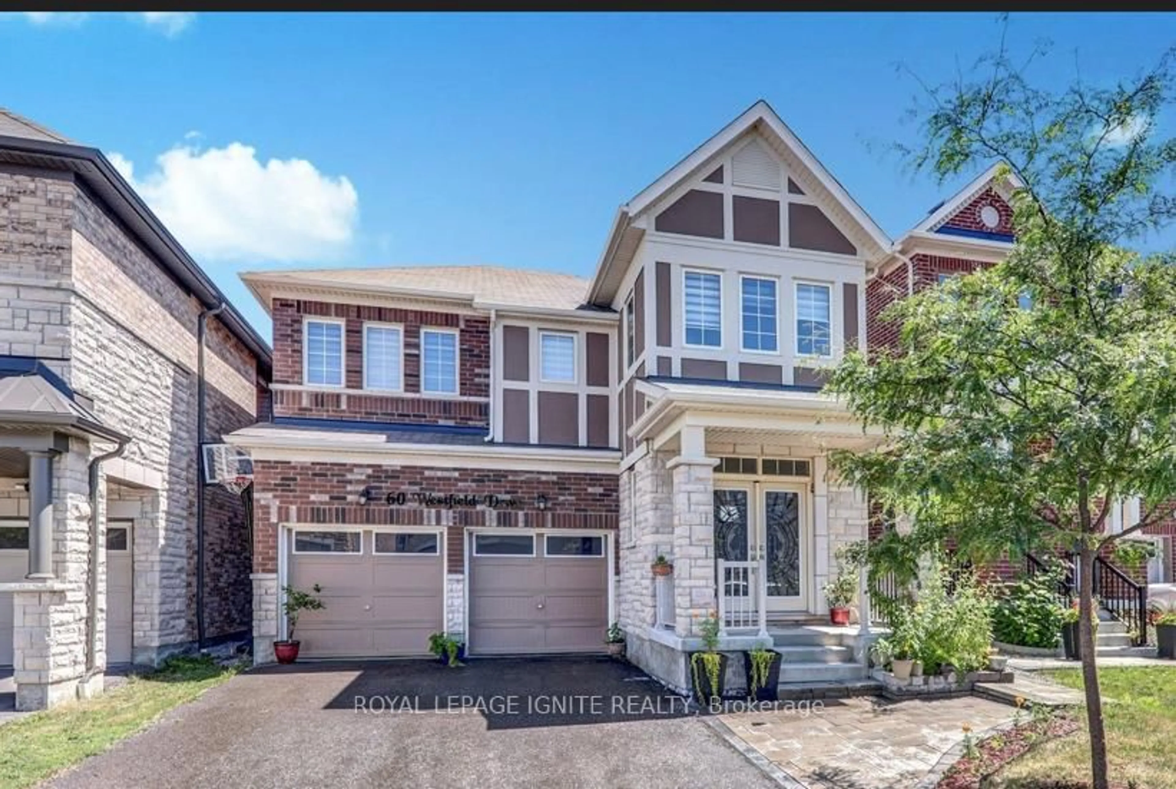 Home with brick exterior material, street for 60 Westfield Dr, Whitby Ontario L1P 0E9