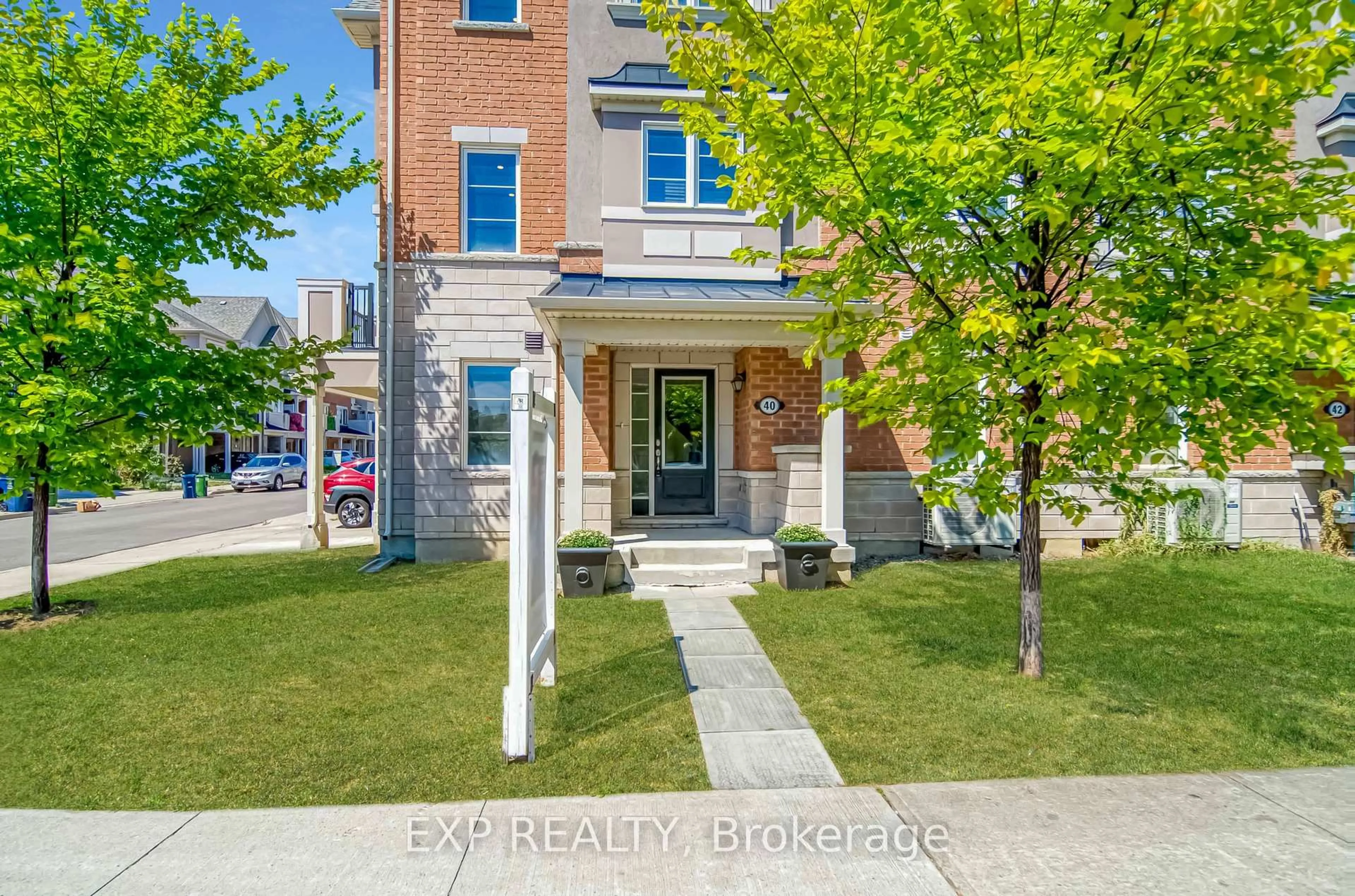 Home with brick exterior material, street for 40 Deans Dr, Toronto Ontario M1L 0J4