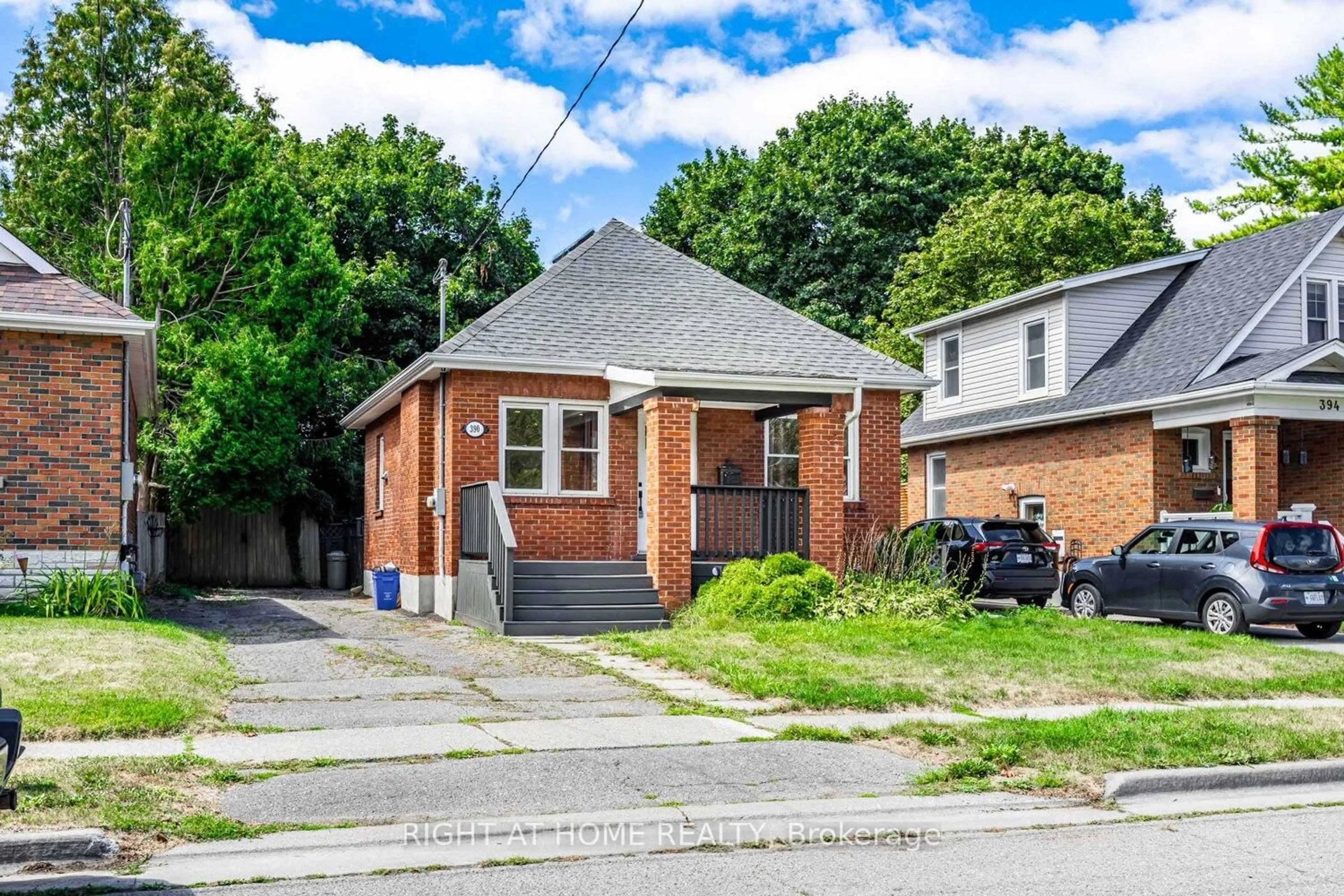 Home with brick exterior material, street for 390 Jarvis St, Oshawa Ontario L1G 5L2