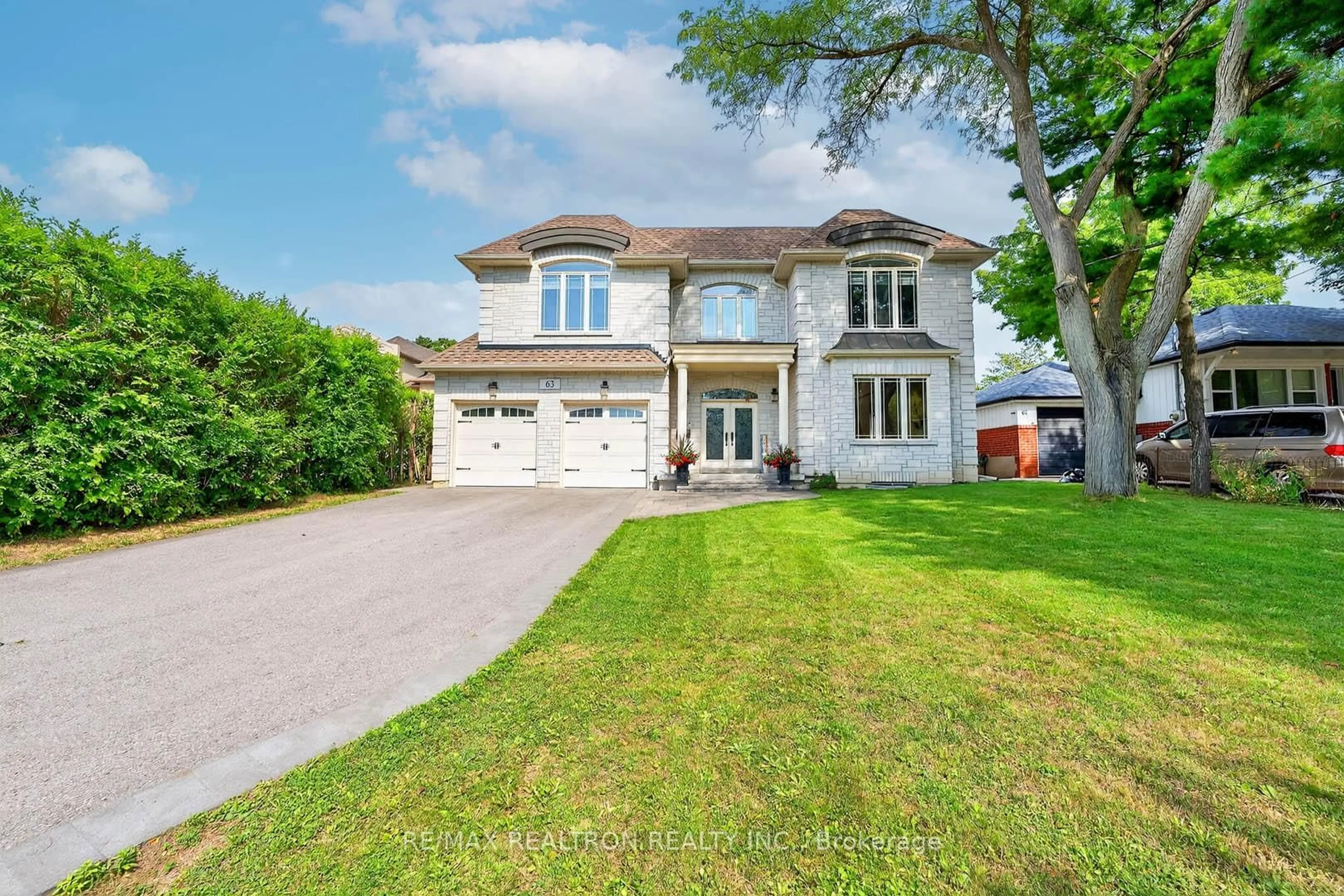 Home with brick exterior material, street for 63 Reidmount Ave, Toronto Ontario M1S 1B6