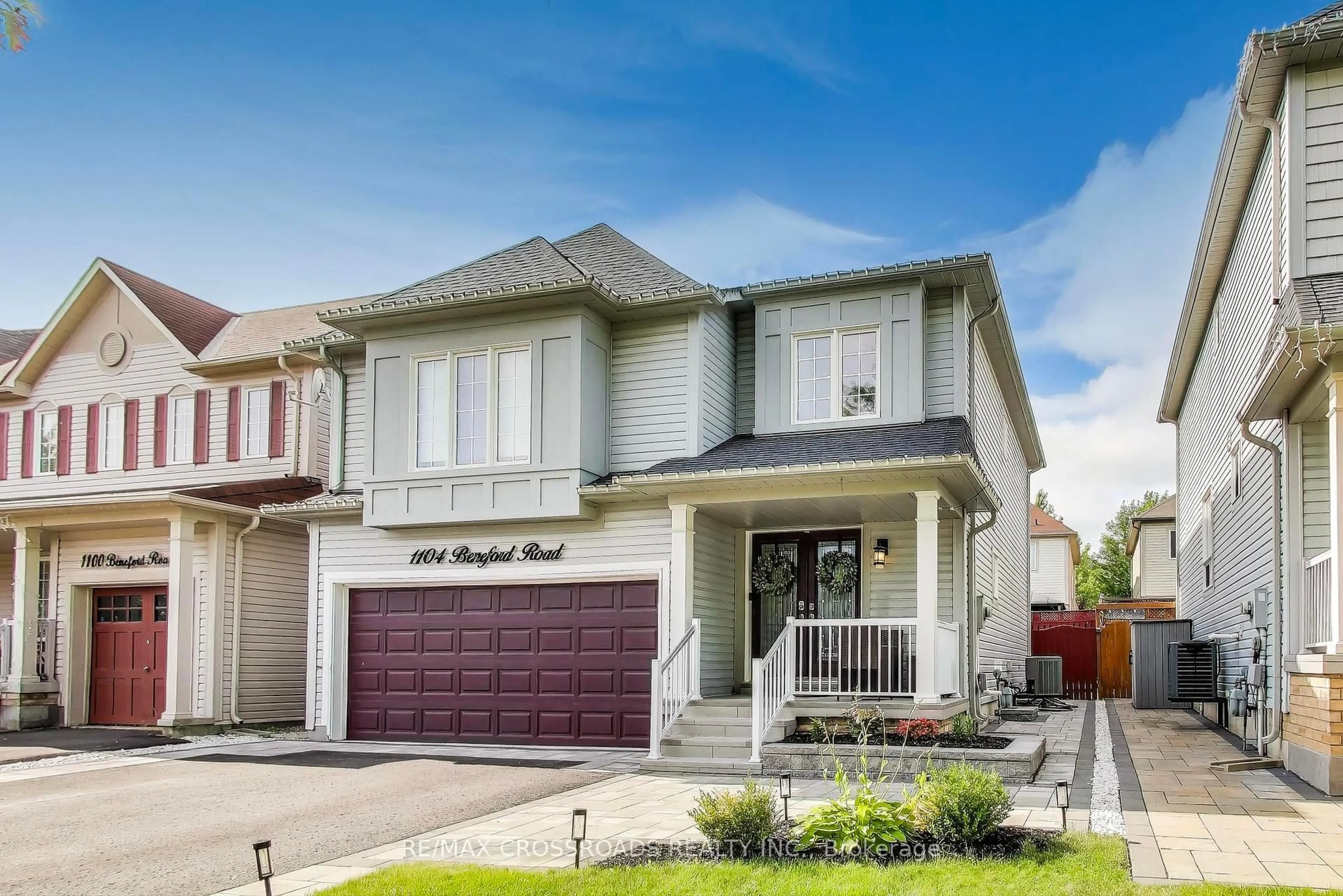 Home with vinyl exterior material, street for 1104 Beneford Rd, Oshawa Ontario L1K 0A3