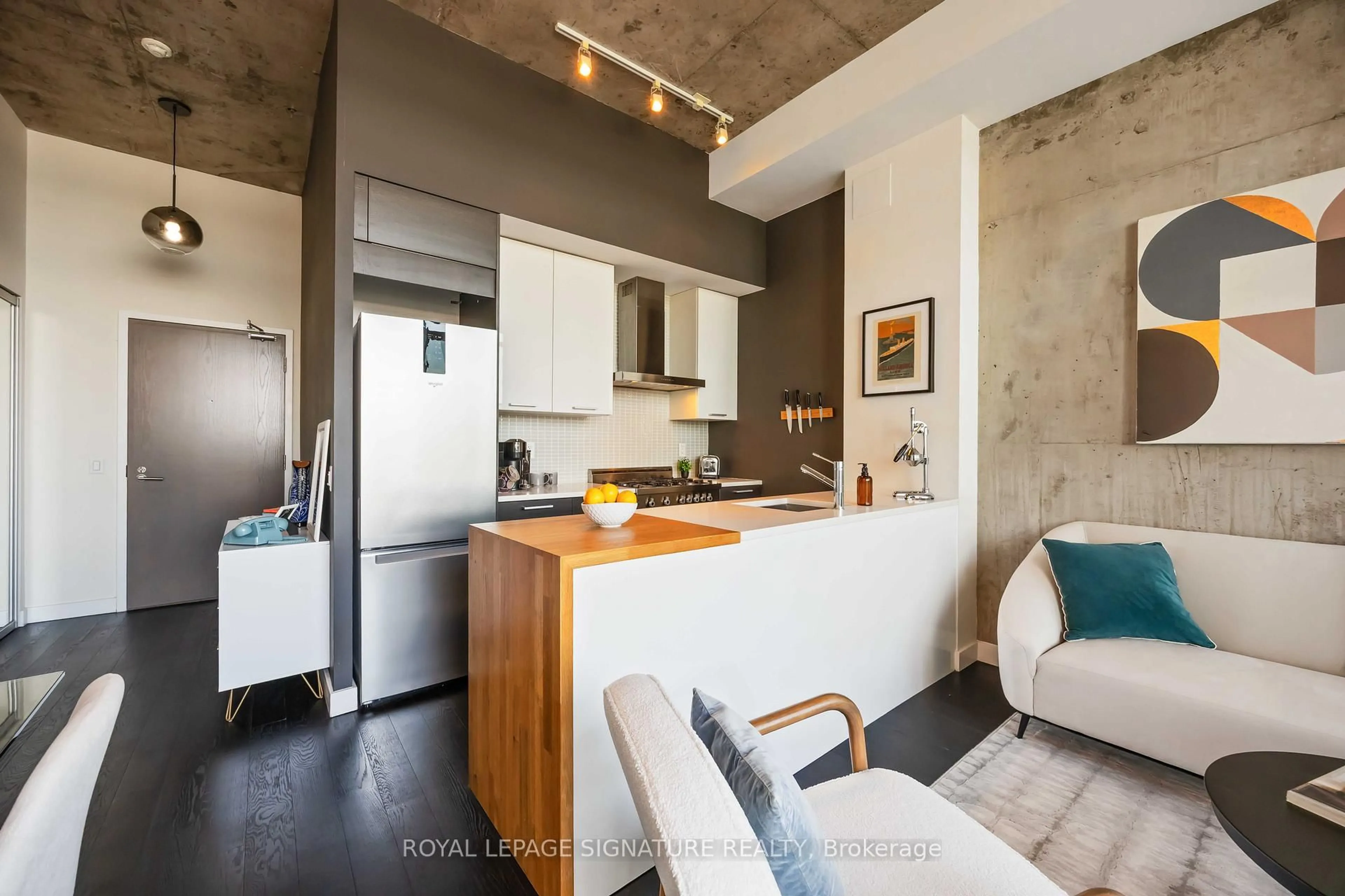 Open concept kitchen, cement floor for 90 Broadview Ave #913, Toronto Ontario M4M 0A7