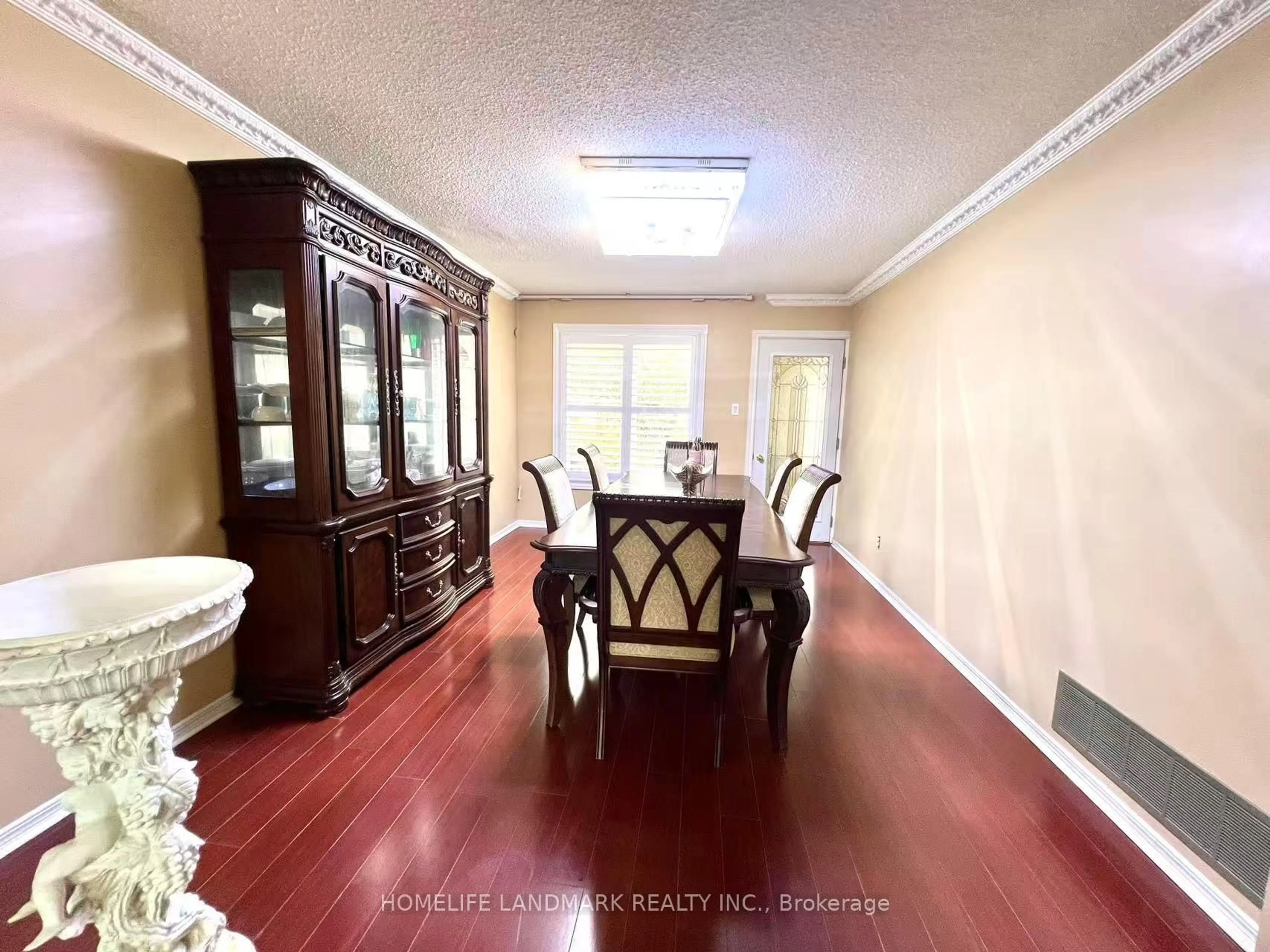 Dining room, wood/laminate floor for 327 Goldhawk Tr, Toronto Ontario M1V 4H2