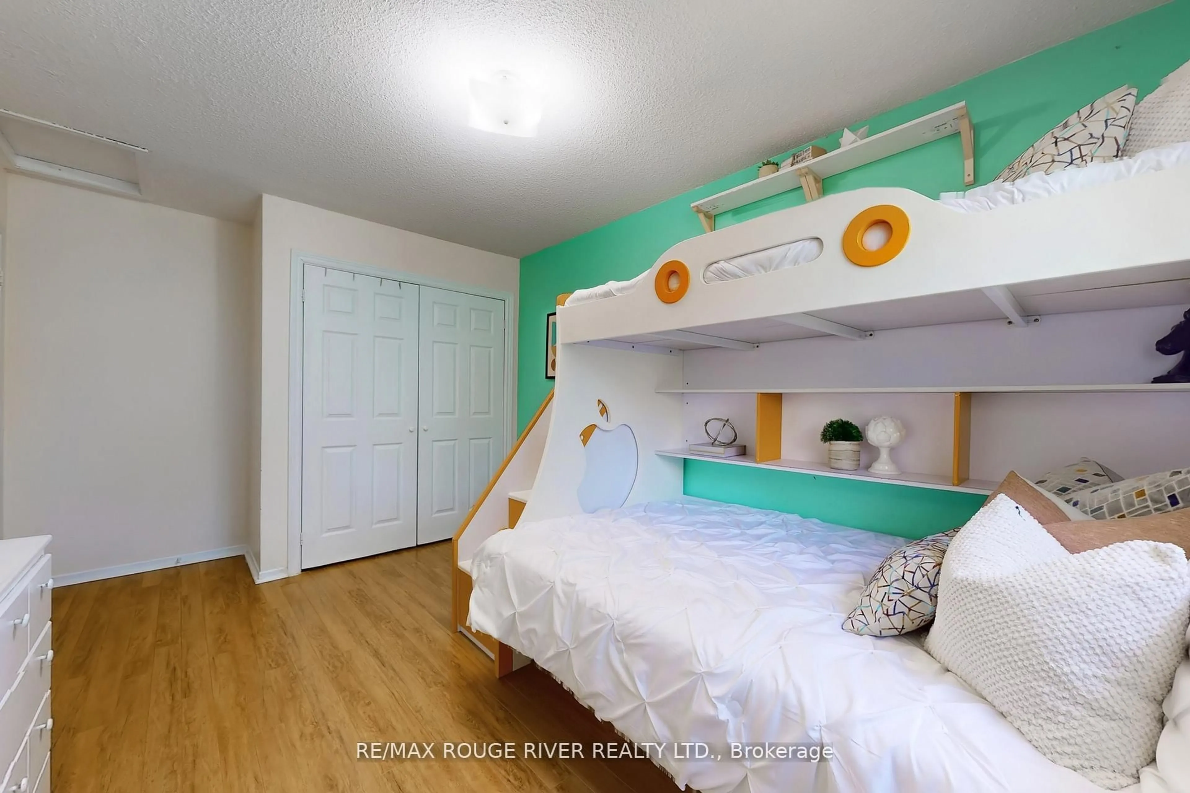 Bedroom with bed, wood/laminate floor for 34 Dundalk Dr #24, Toronto Ontario M1P 4W3
