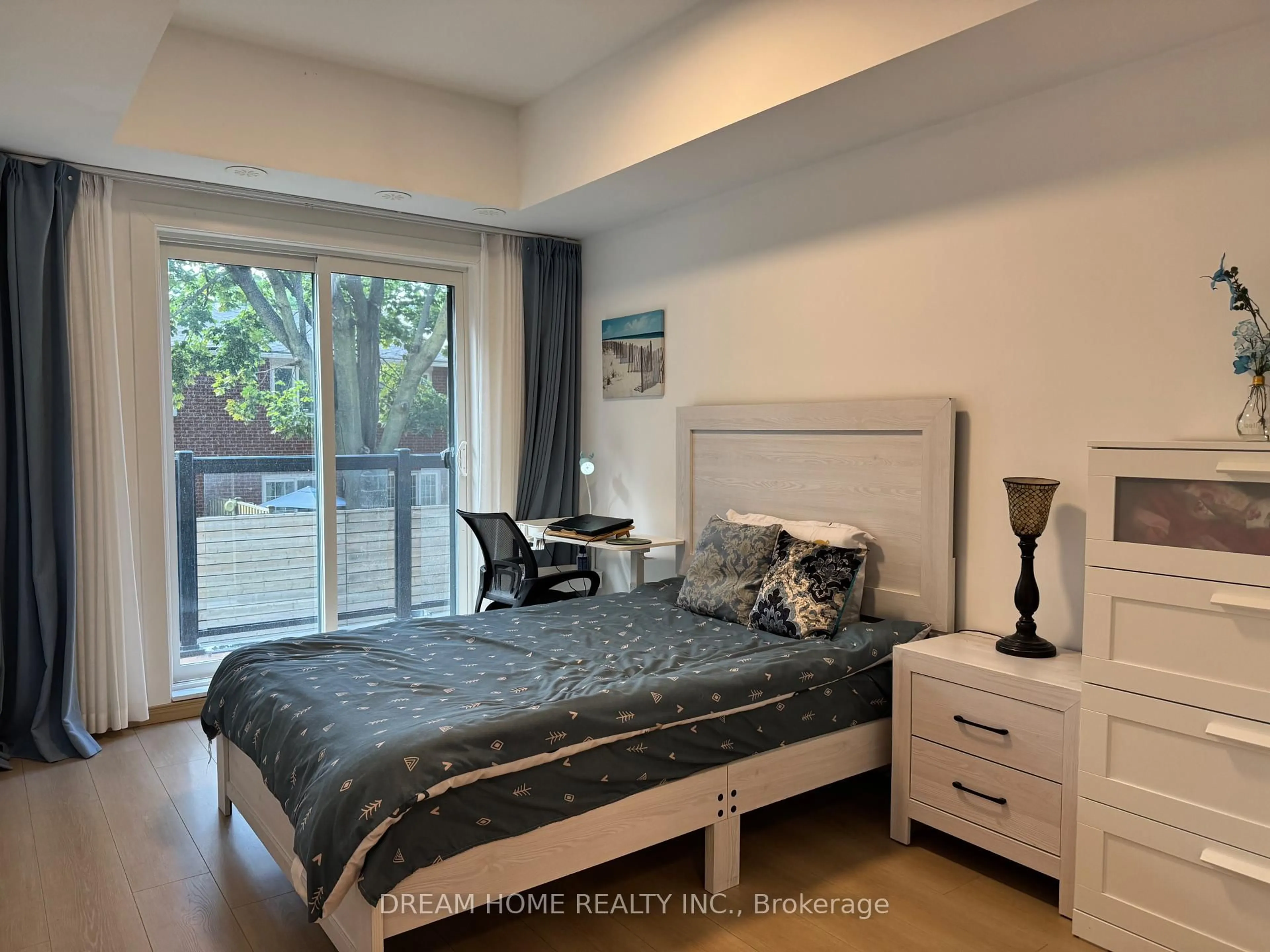 Bedroom with bed, wood/laminate floor for 3425 Sheppard Ave #205, Toronto Ontario M1T 3K5