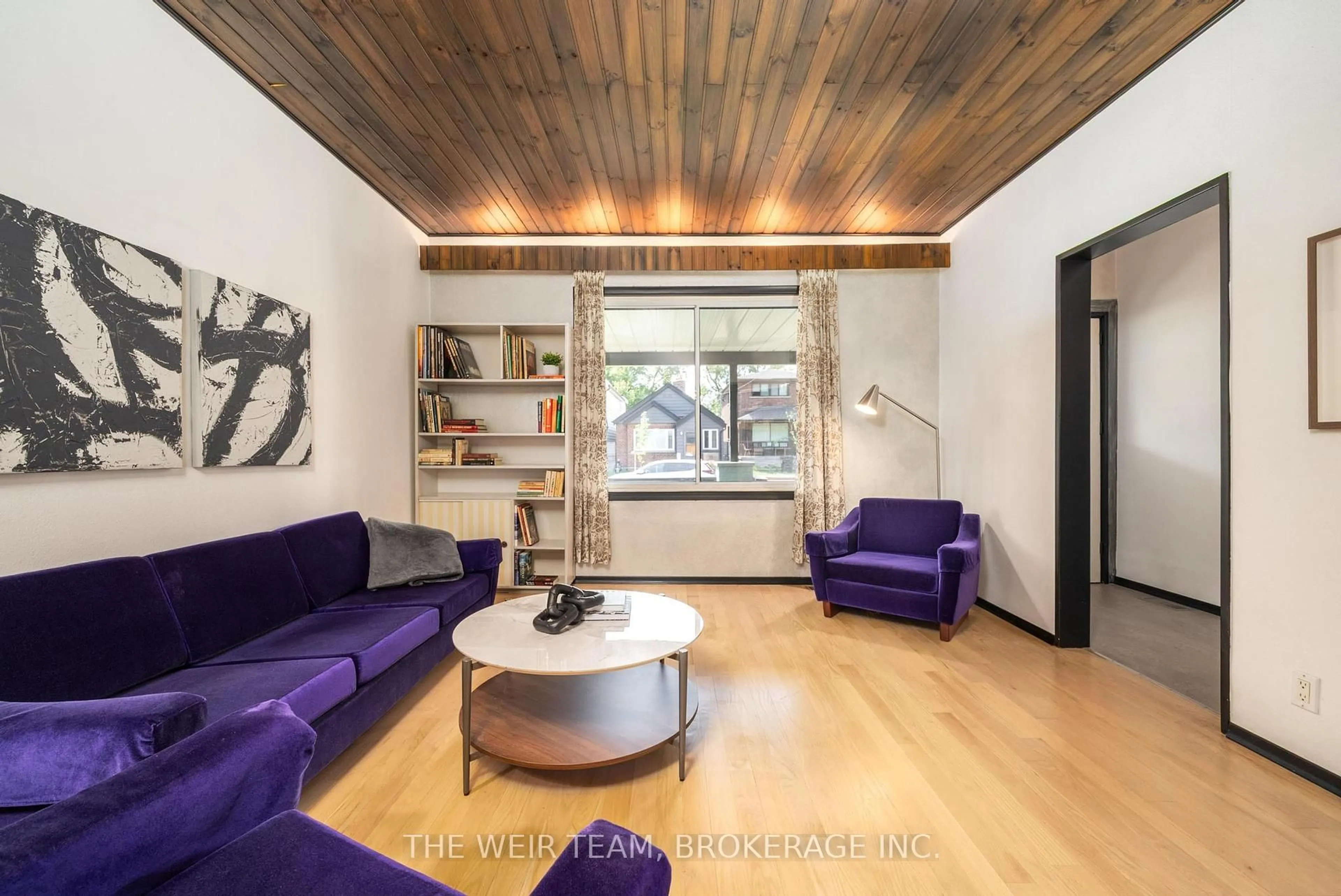 Living room with furniture, wood/laminate floor for 37 Coleridge Ave, Toronto Ontario M4C 4H4