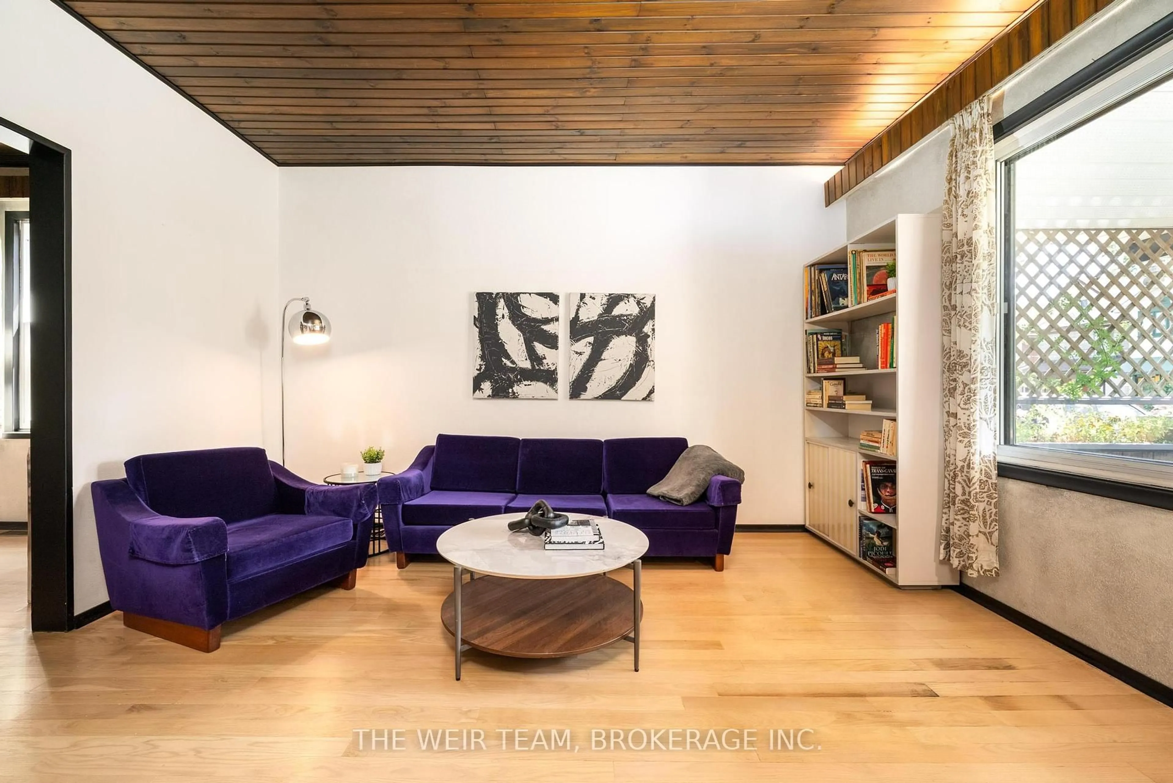 Living room with furniture, wood/laminate floor for 37 Coleridge Ave, Toronto Ontario M4C 4H4