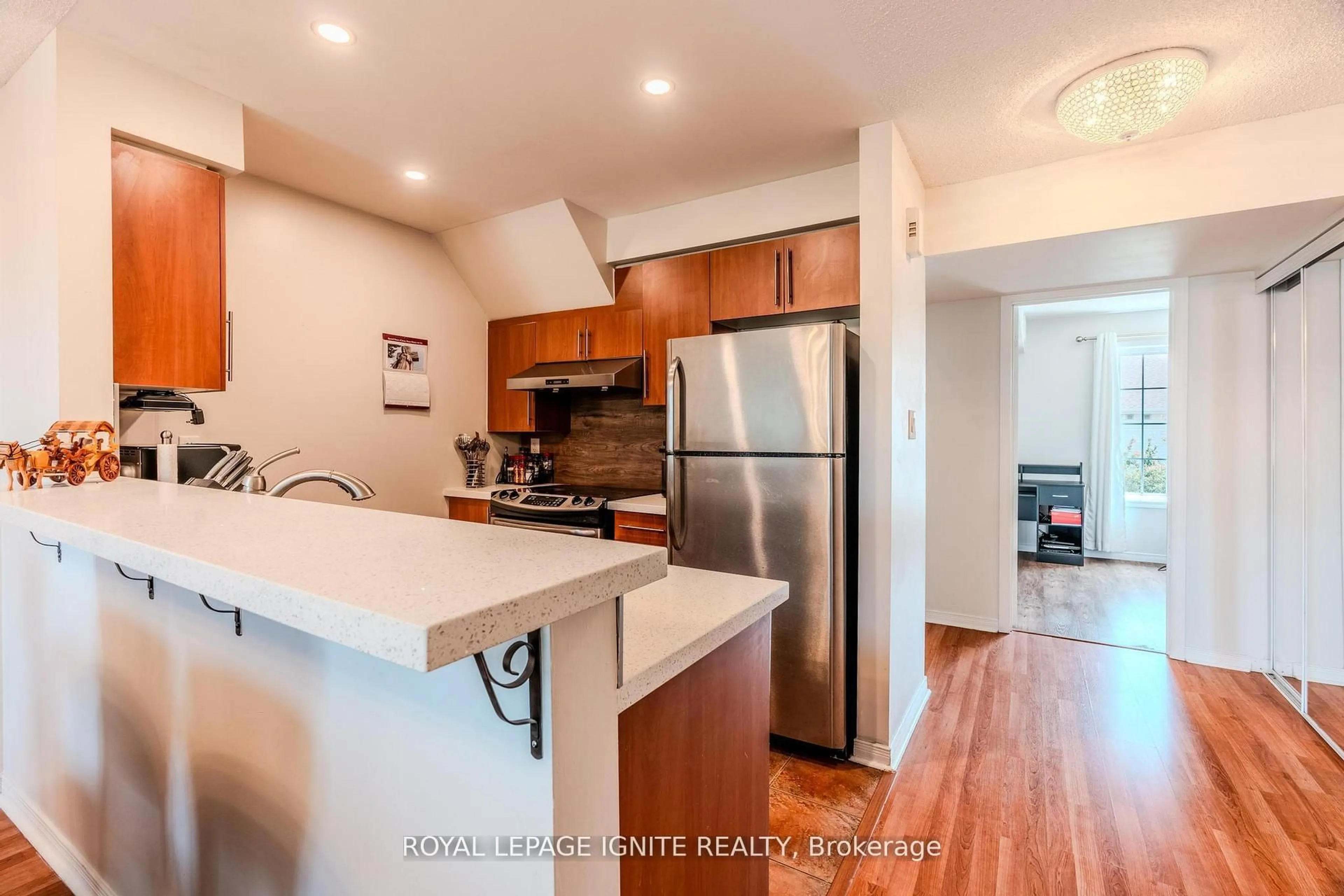 Open concept kitchen, wood/laminate floor for 120 Petra Way #3, Whitby Ontario L1R 0A2