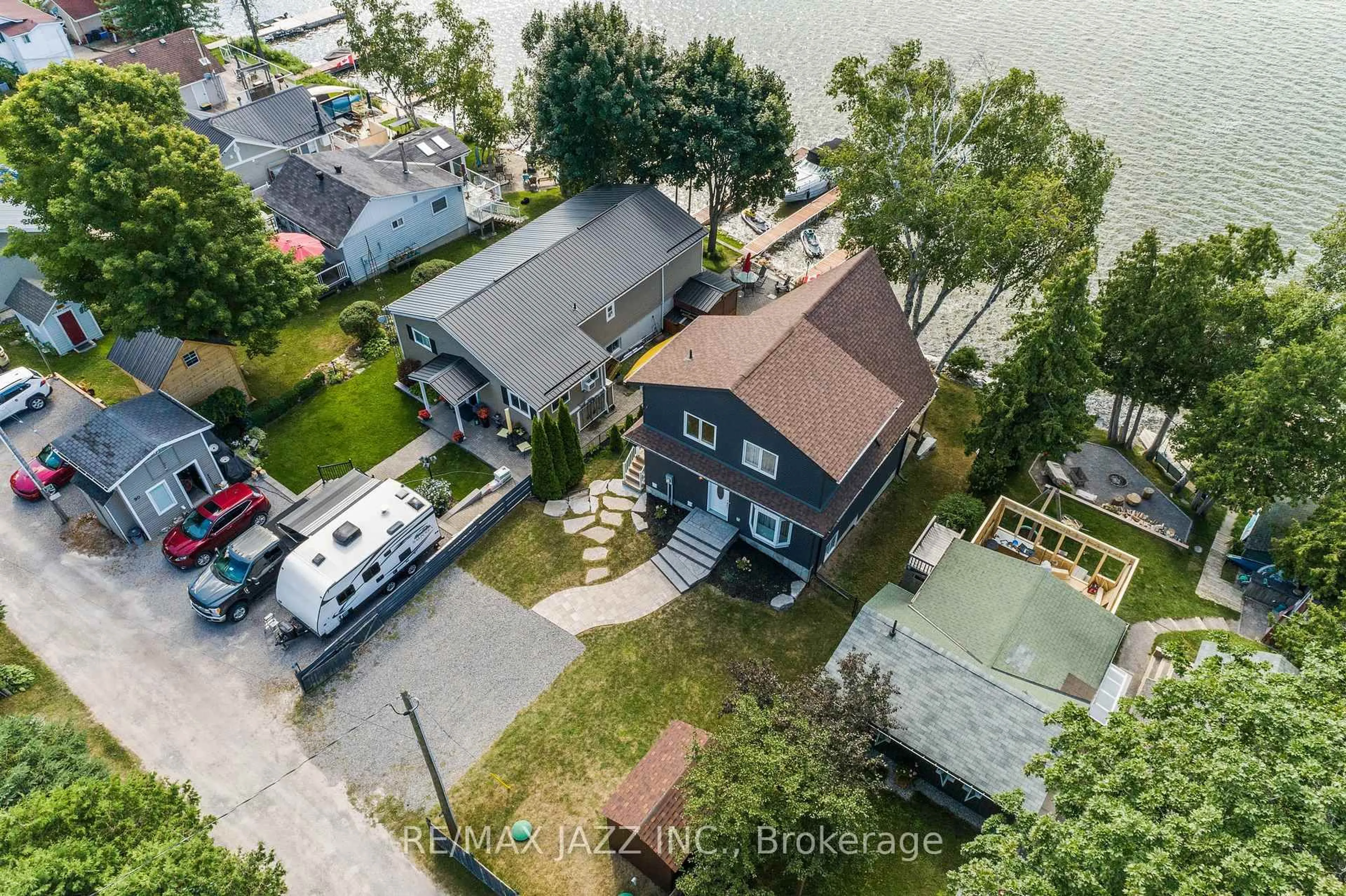 A pic from outside/outdoor area/front of a property/back of a property/a pic from drone, water/lake/river/ocean view for 94 Coleman Lane, Scugog Ontario L0B 1K0