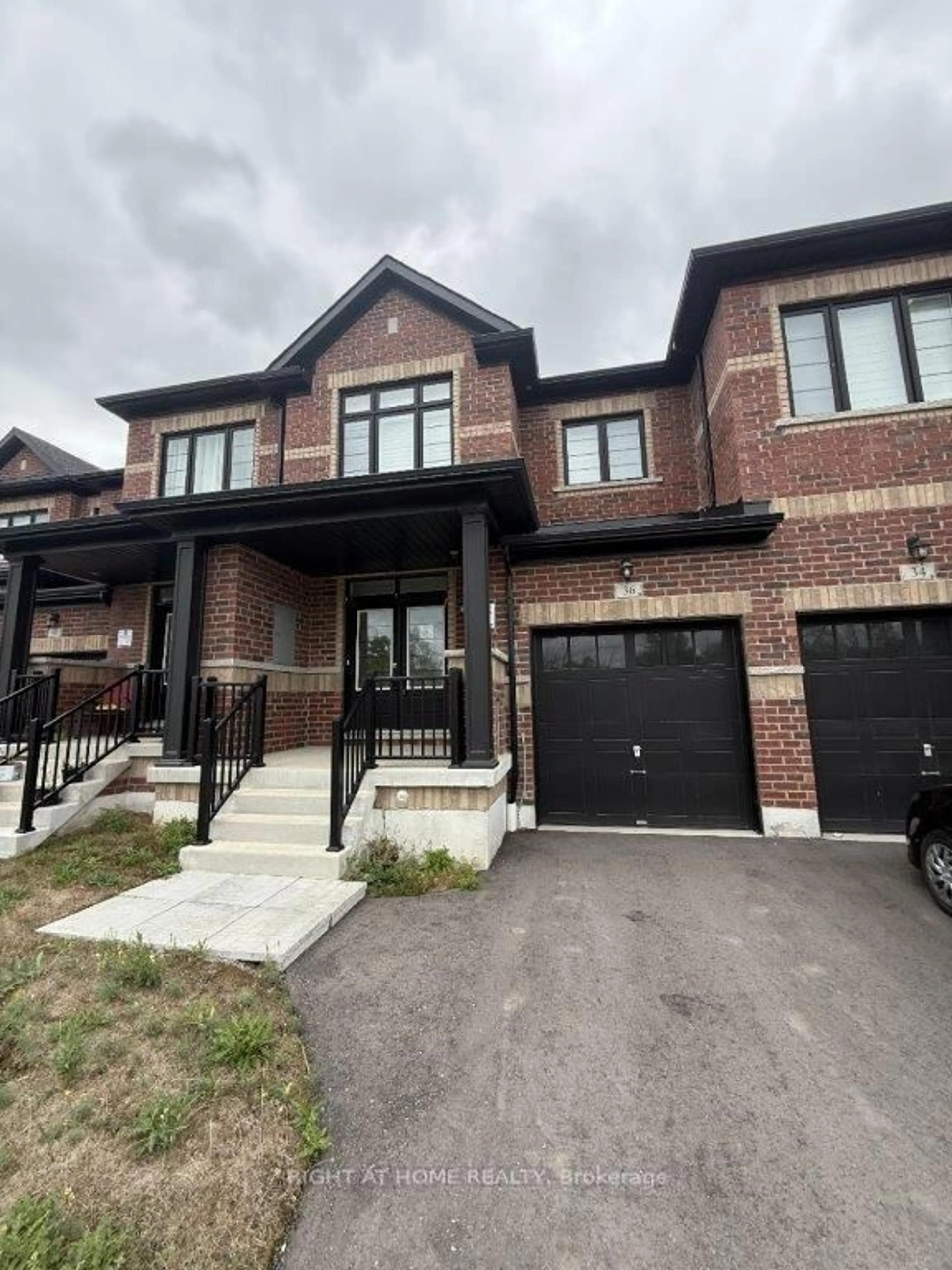 Home with brick exterior material, street for 36 Littlewood Dr, Whitby Ontario L1P 0G5