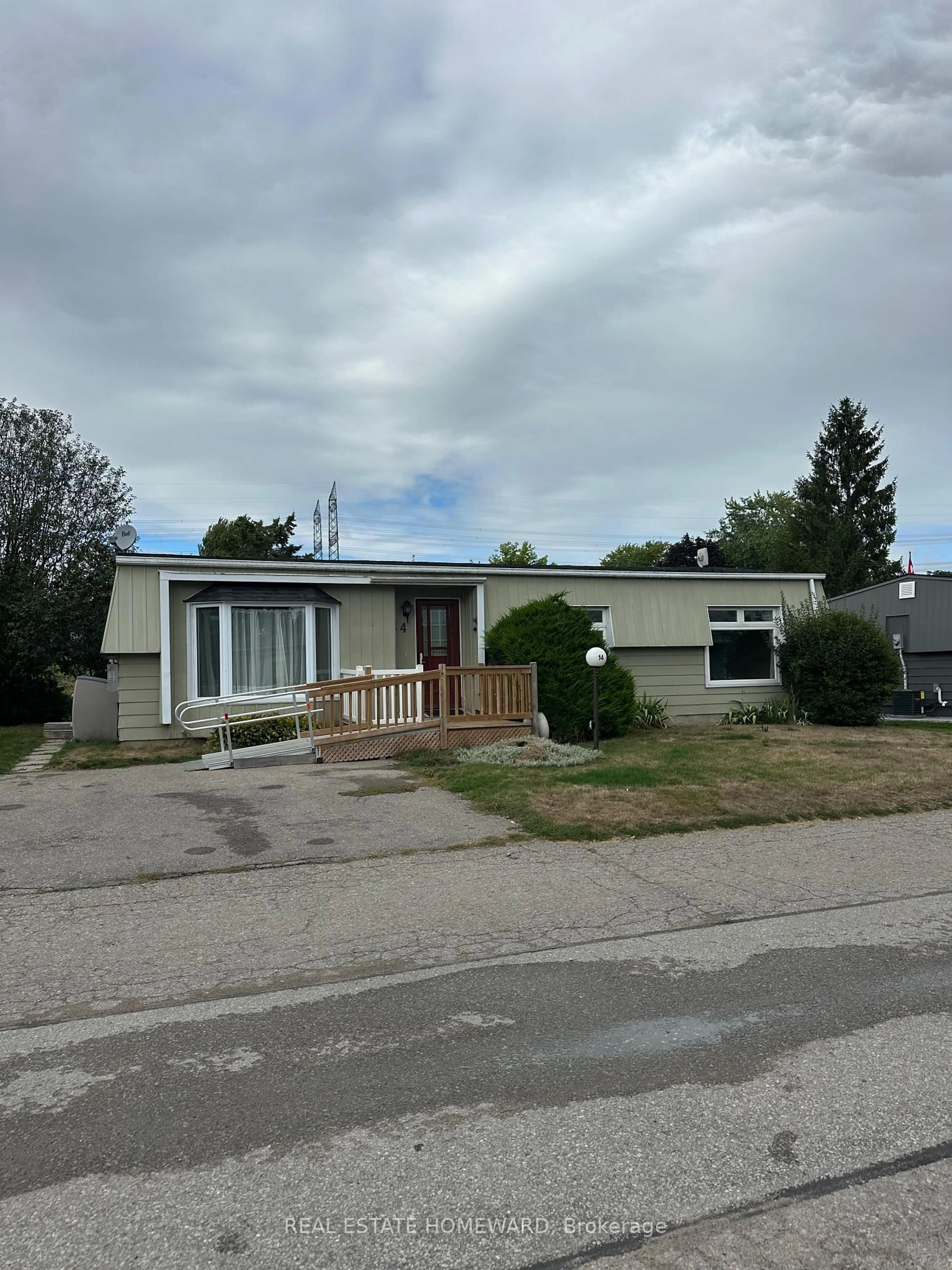 Home with vinyl exterior material, street for 14 Heritage Lane, Clarington Ontario L1B 1A3