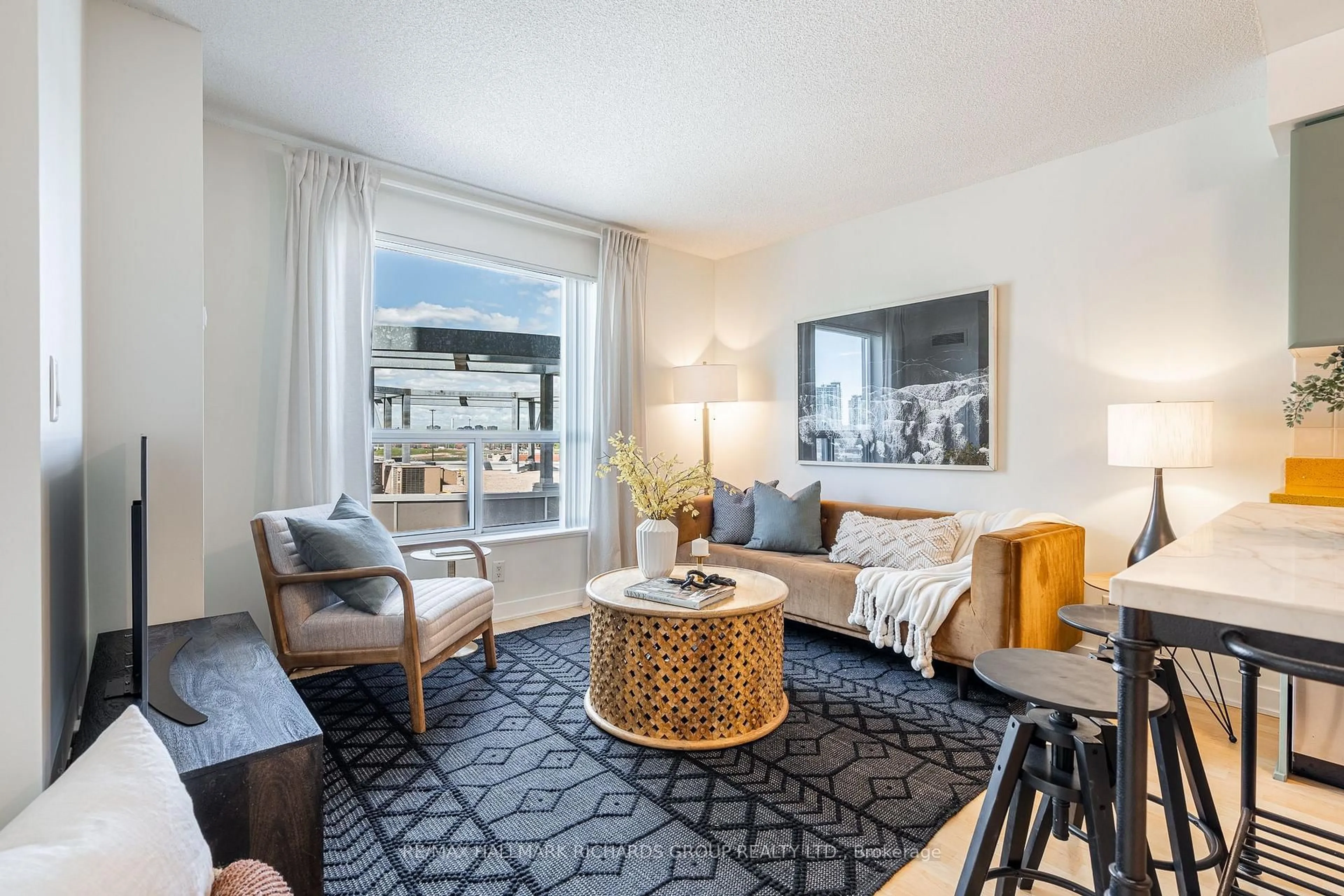 Living room with furniture, unknown for 38 Lee Centre Dr #811, Toronto Ontario M1H 3J7