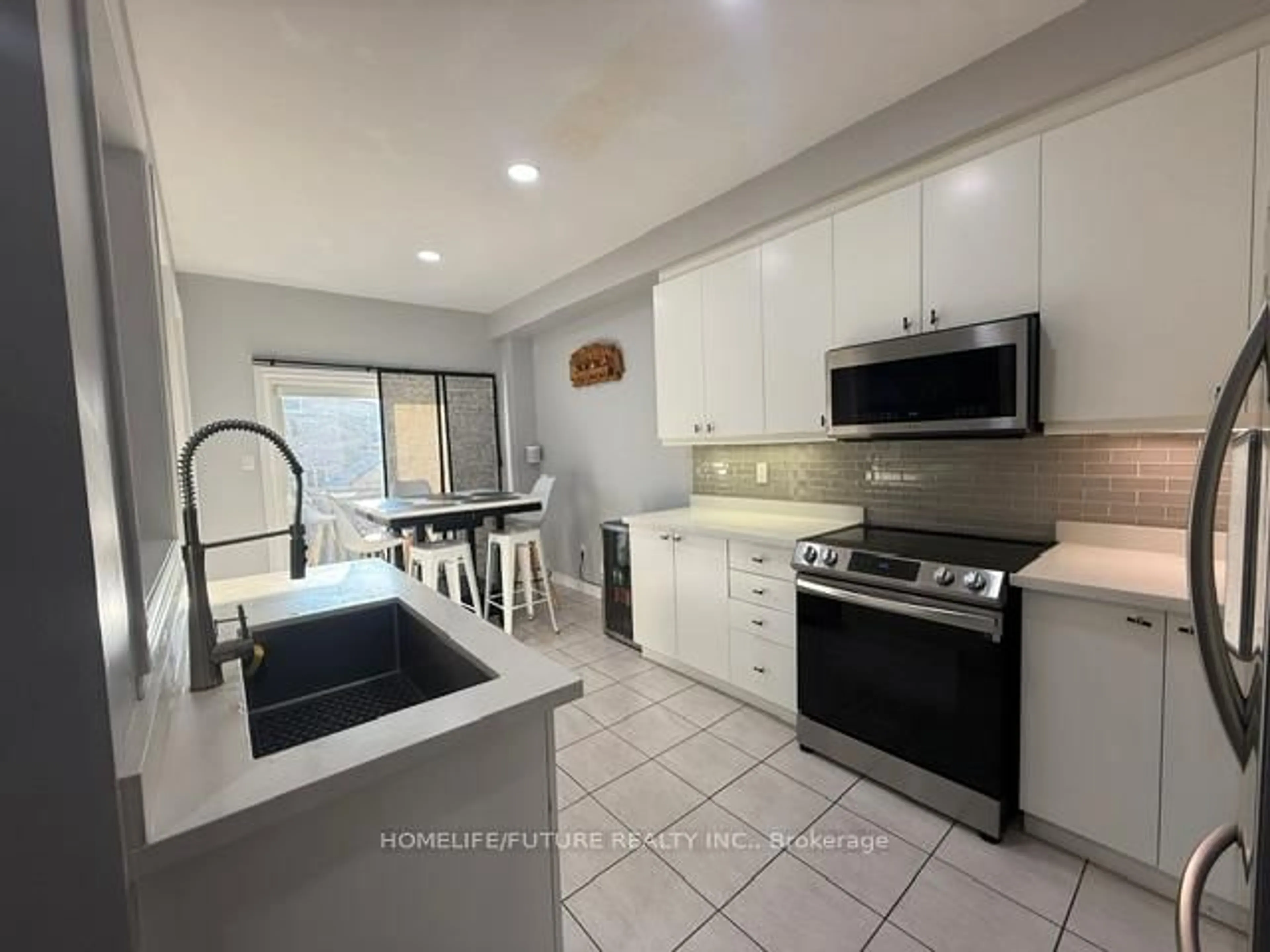 Open concept kitchen, ceramic/tile floor for 44 Arfield Ave, Ajax Ontario L1Z 0G5