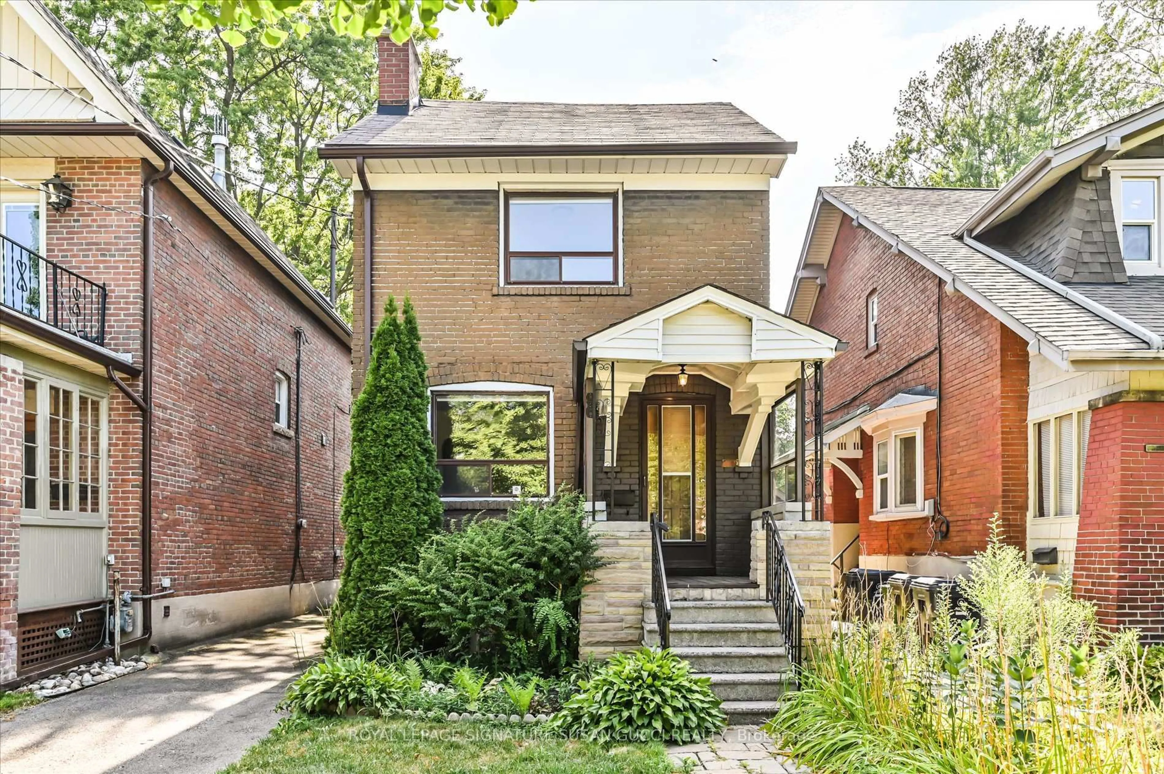 Home with brick exterior material, street for 96 Woodycrest Ave, Toronto Ontario M4J 3A9