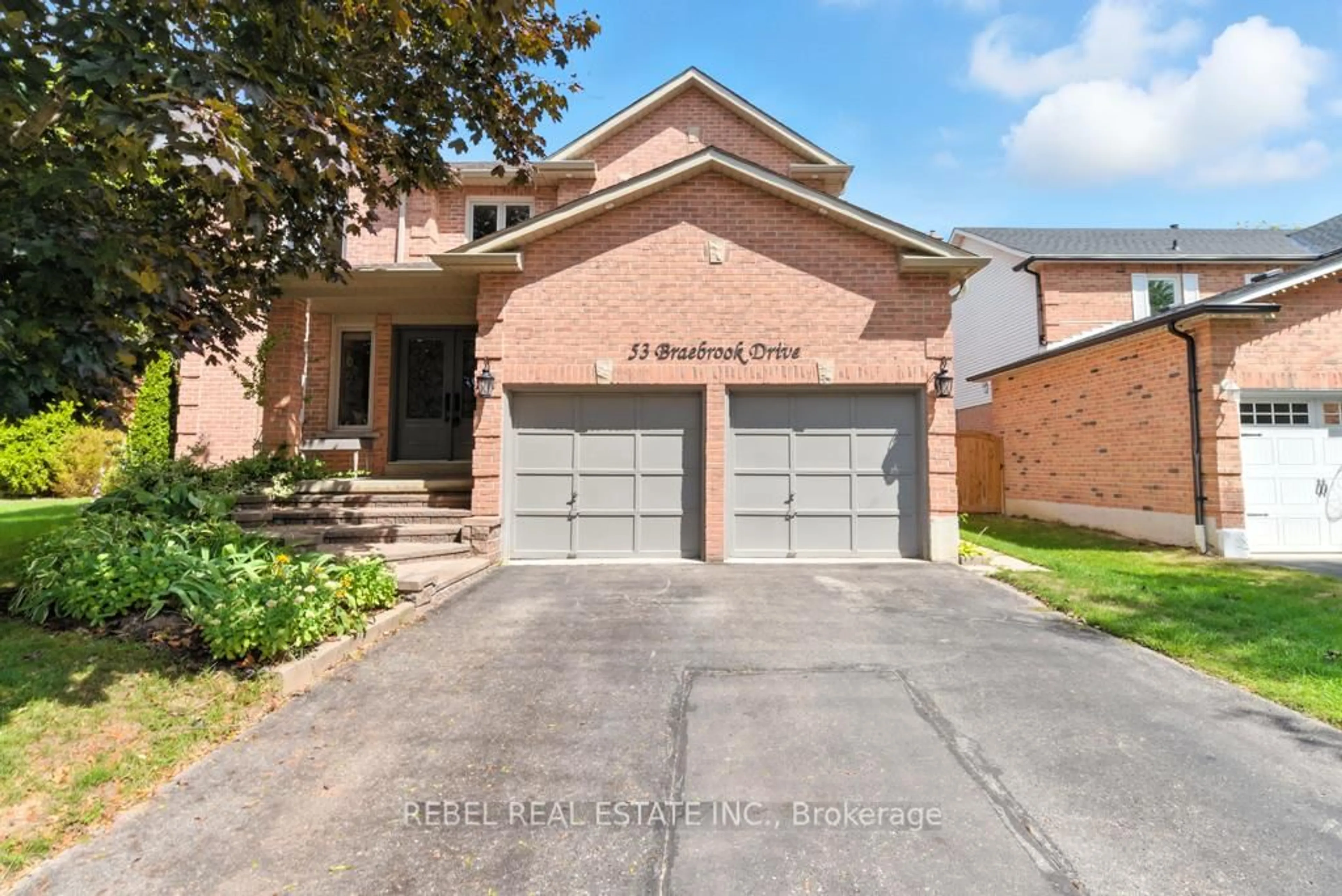 Home with brick exterior material, street for 53 Braebrook Dr, Whitby Ontario L1R 1V6