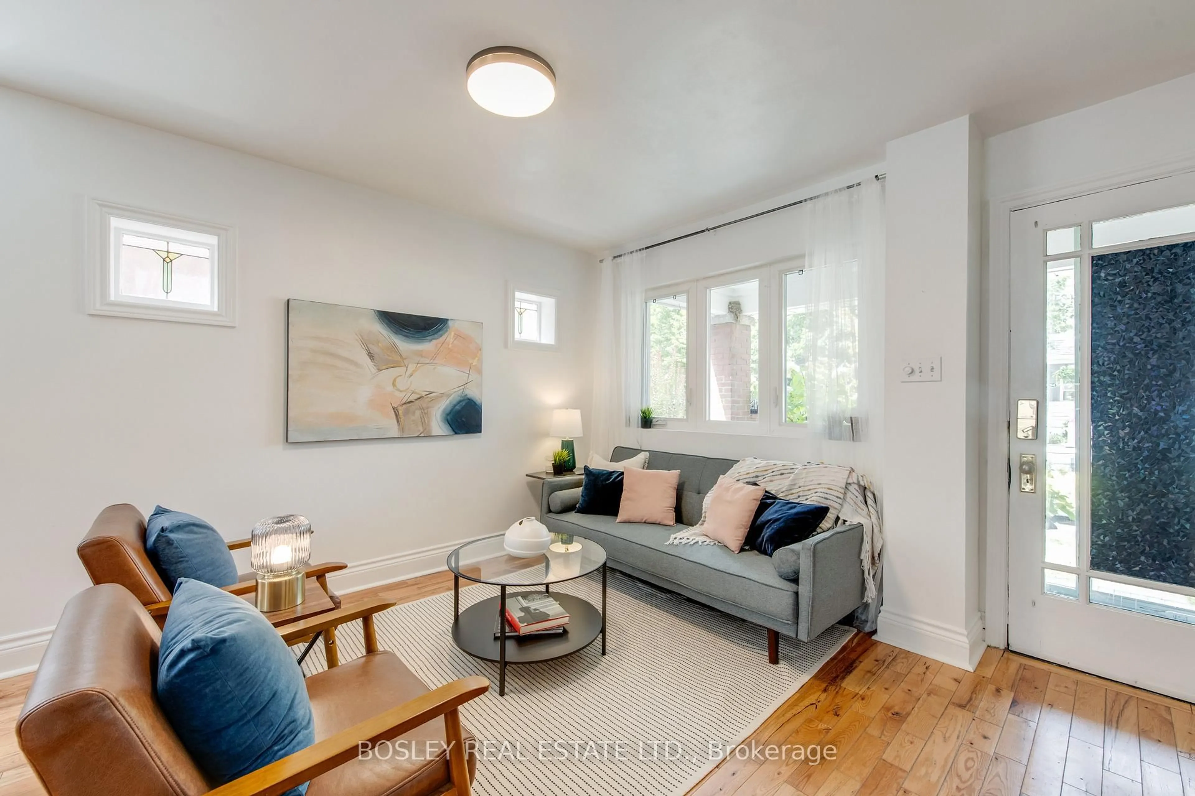 Living room with furniture, unknown for 55 Robbins Ave, Toronto Ontario M4L 1X1