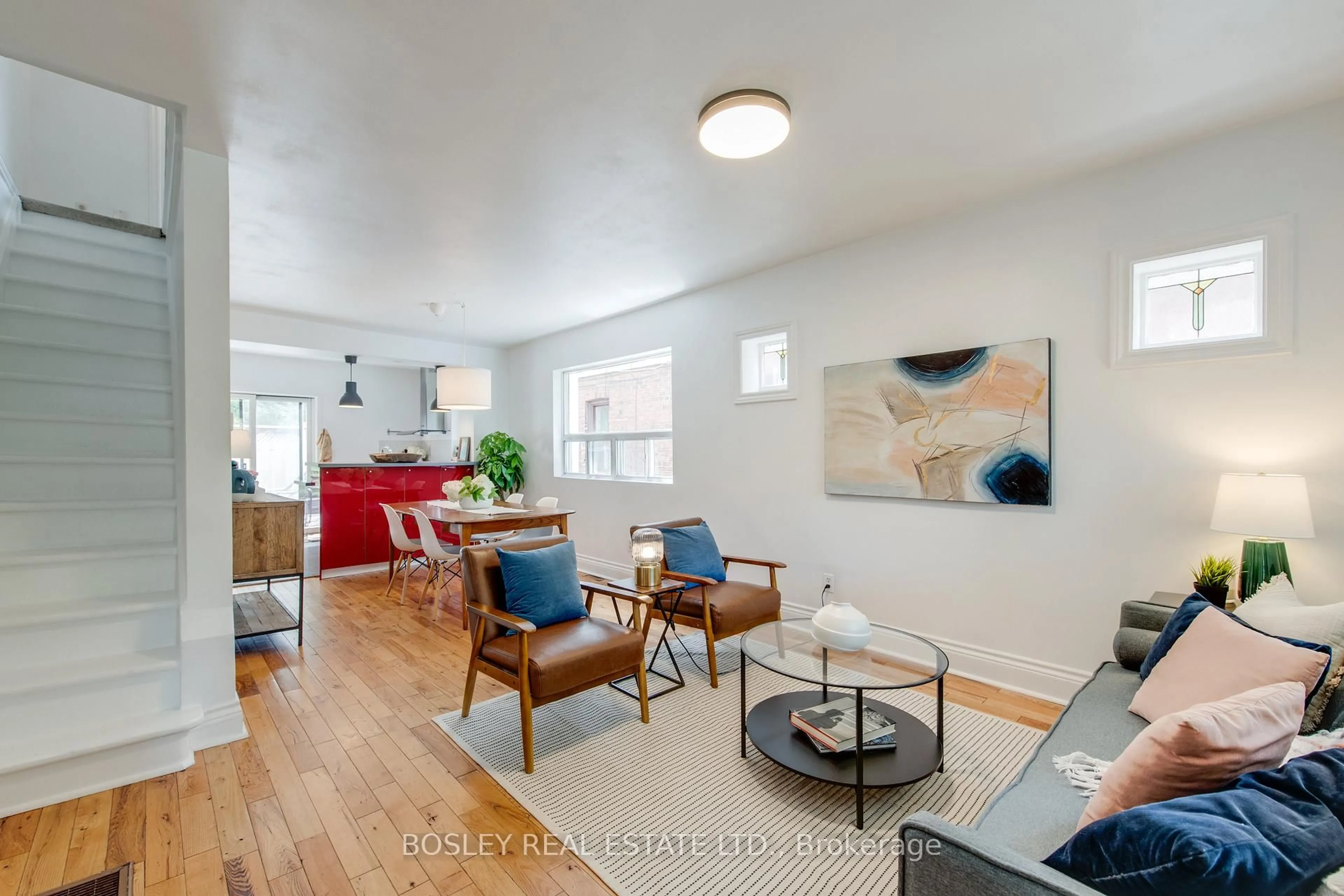 Living room with furniture, unknown for 55 Robbins Ave, Toronto Ontario M4L 1X1