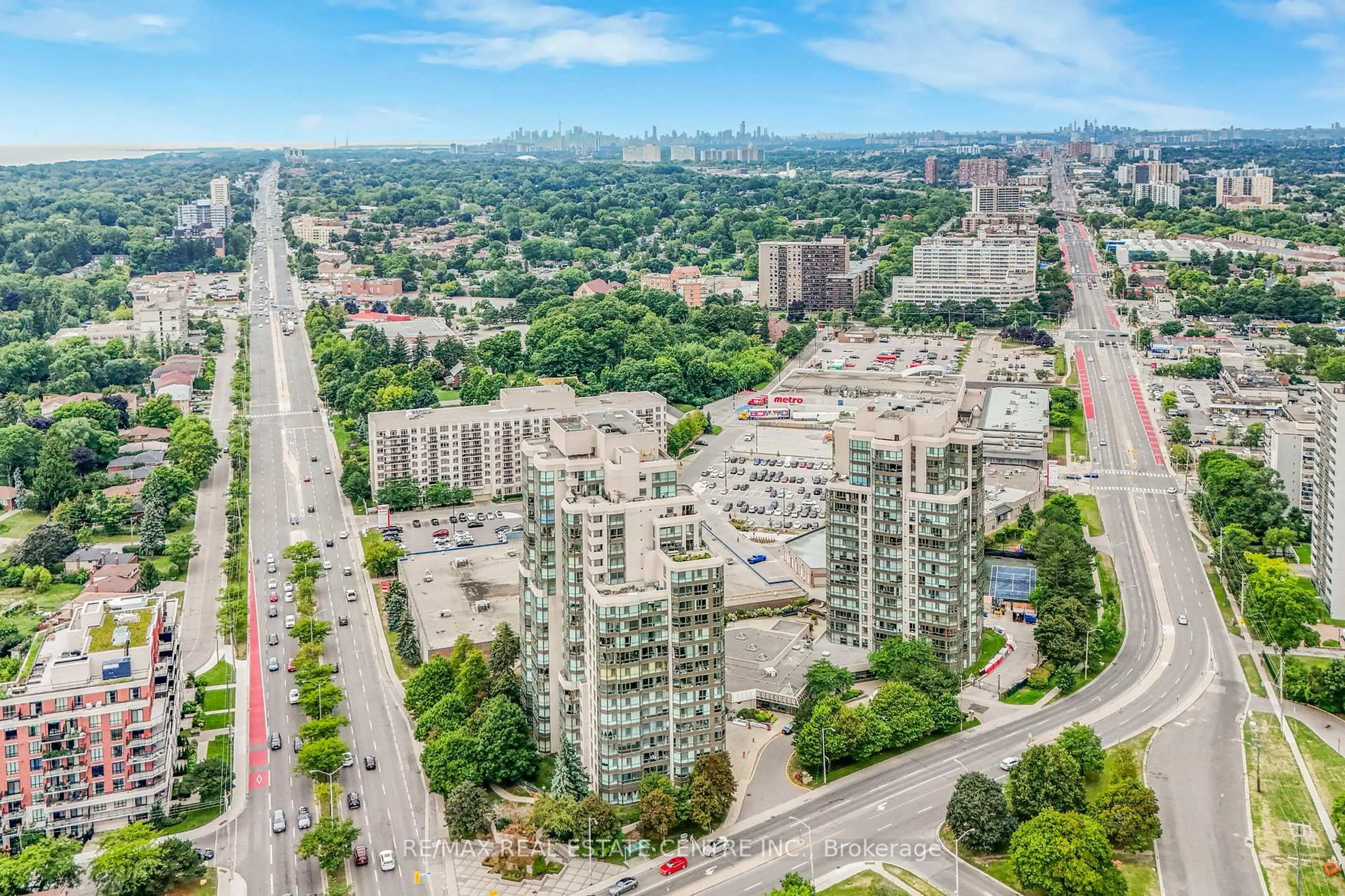 A pic from outside/outdoor area/front of a property/back of a property/a pic from drone, city buildings view from balcony for 3233 Eglinton Ave #407, Toronto Ontario M1J 3N6