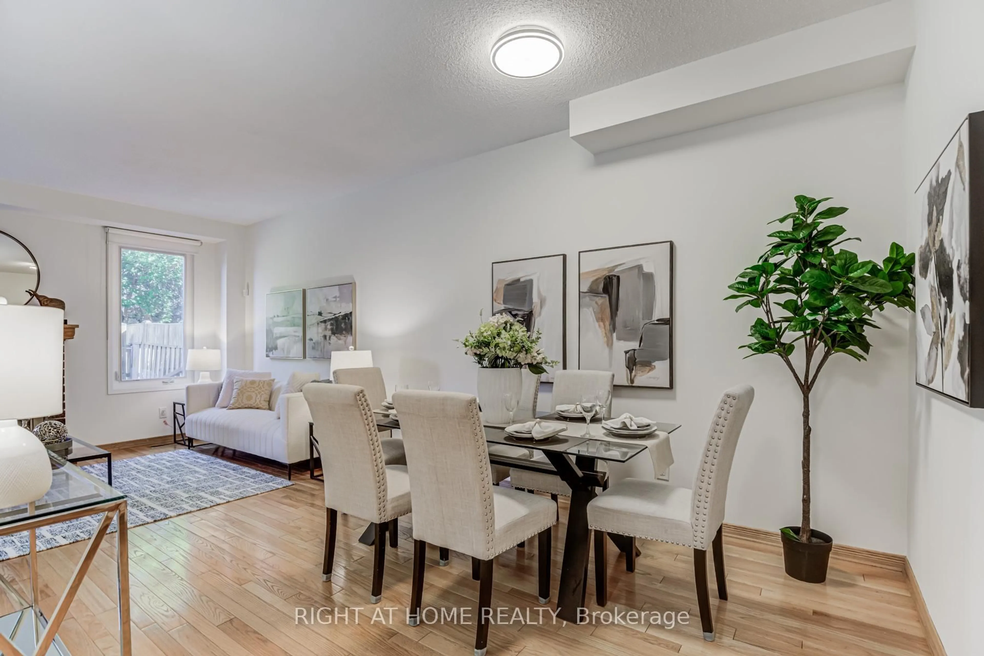 Dining room, wood/laminate floor for 14 Belsay Crt, Toronto Ontario M1W 3W4