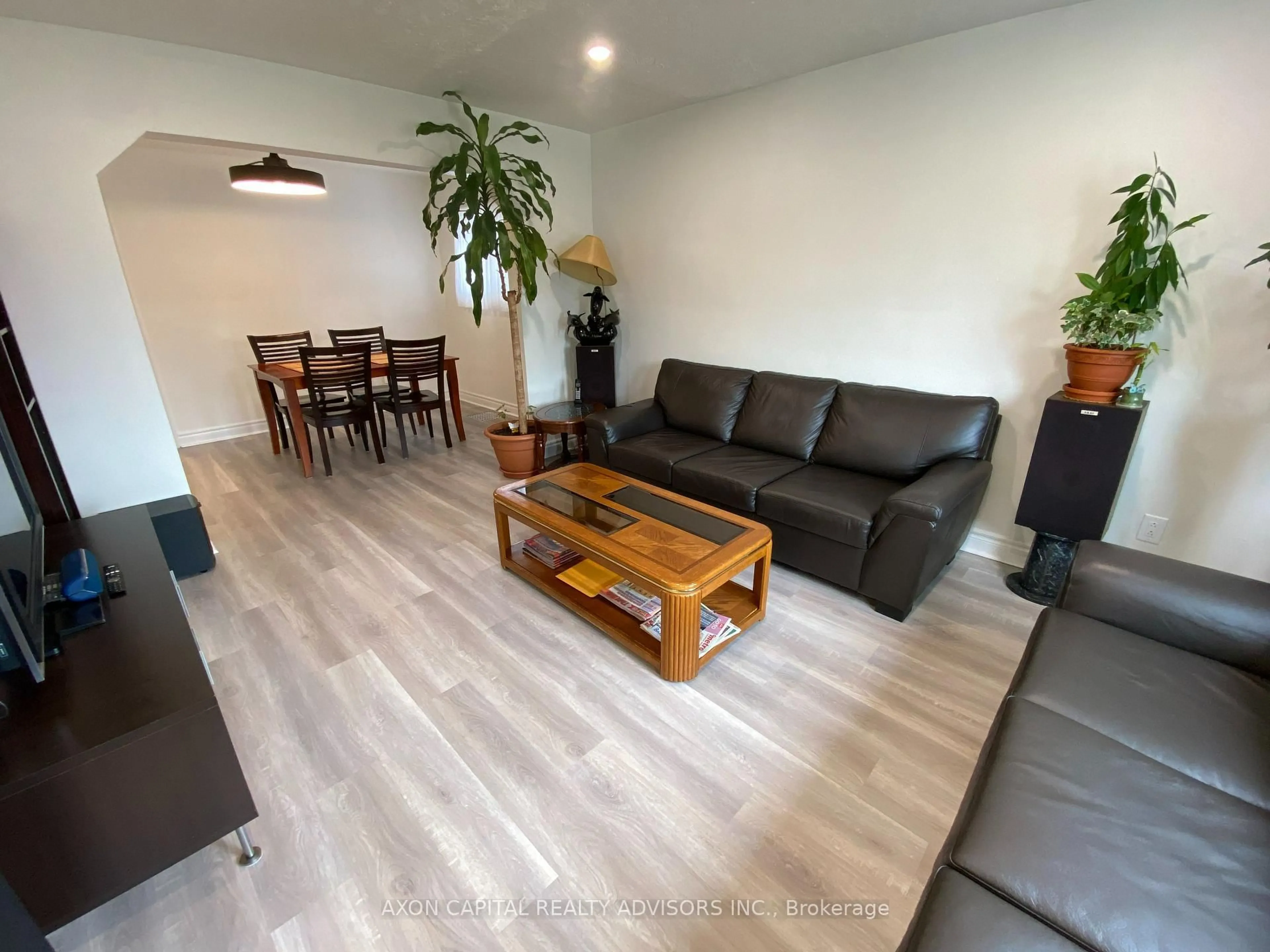 Living room with furniture, wood/laminate floor for 1248 Warden Ave, Toronto Ontario M1R 2R3