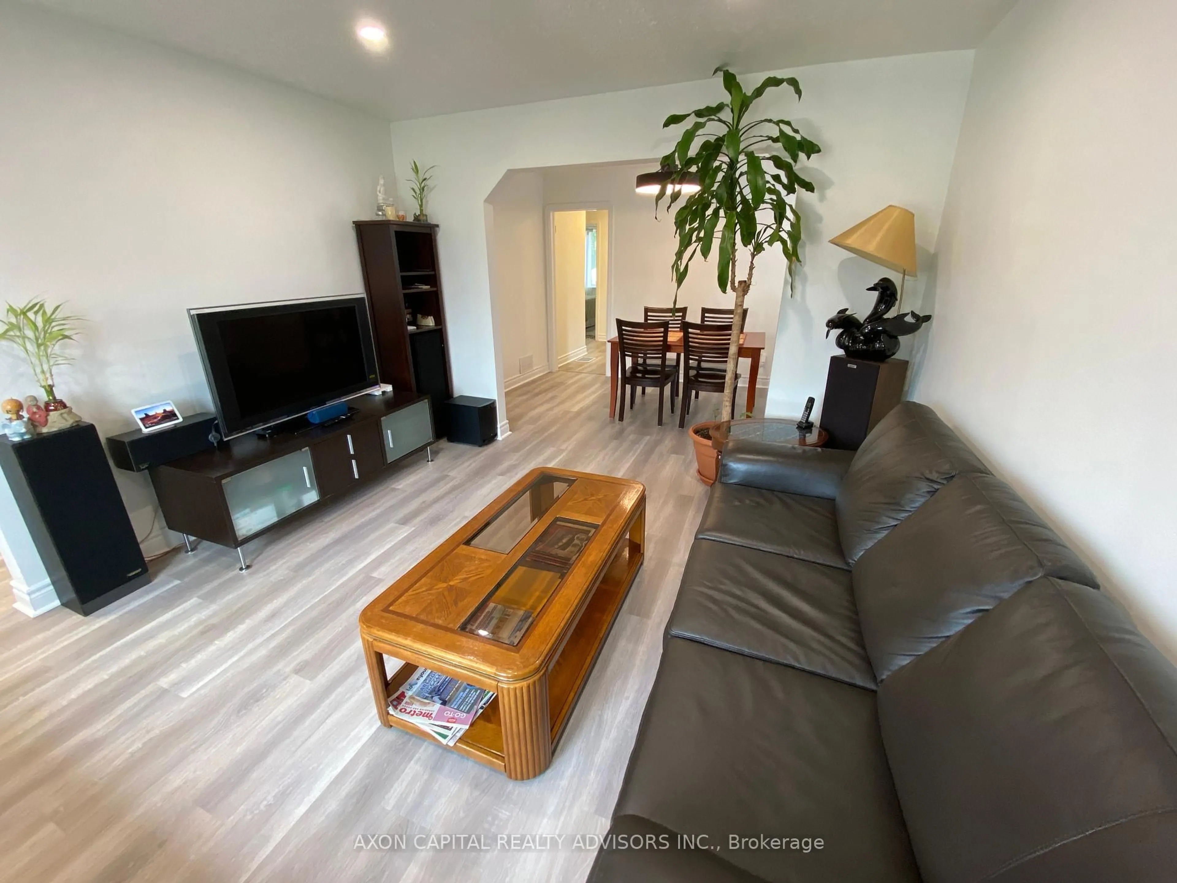 Living room with furniture, wood/laminate floor for 1248 Warden Ave, Toronto Ontario M1R 2R3