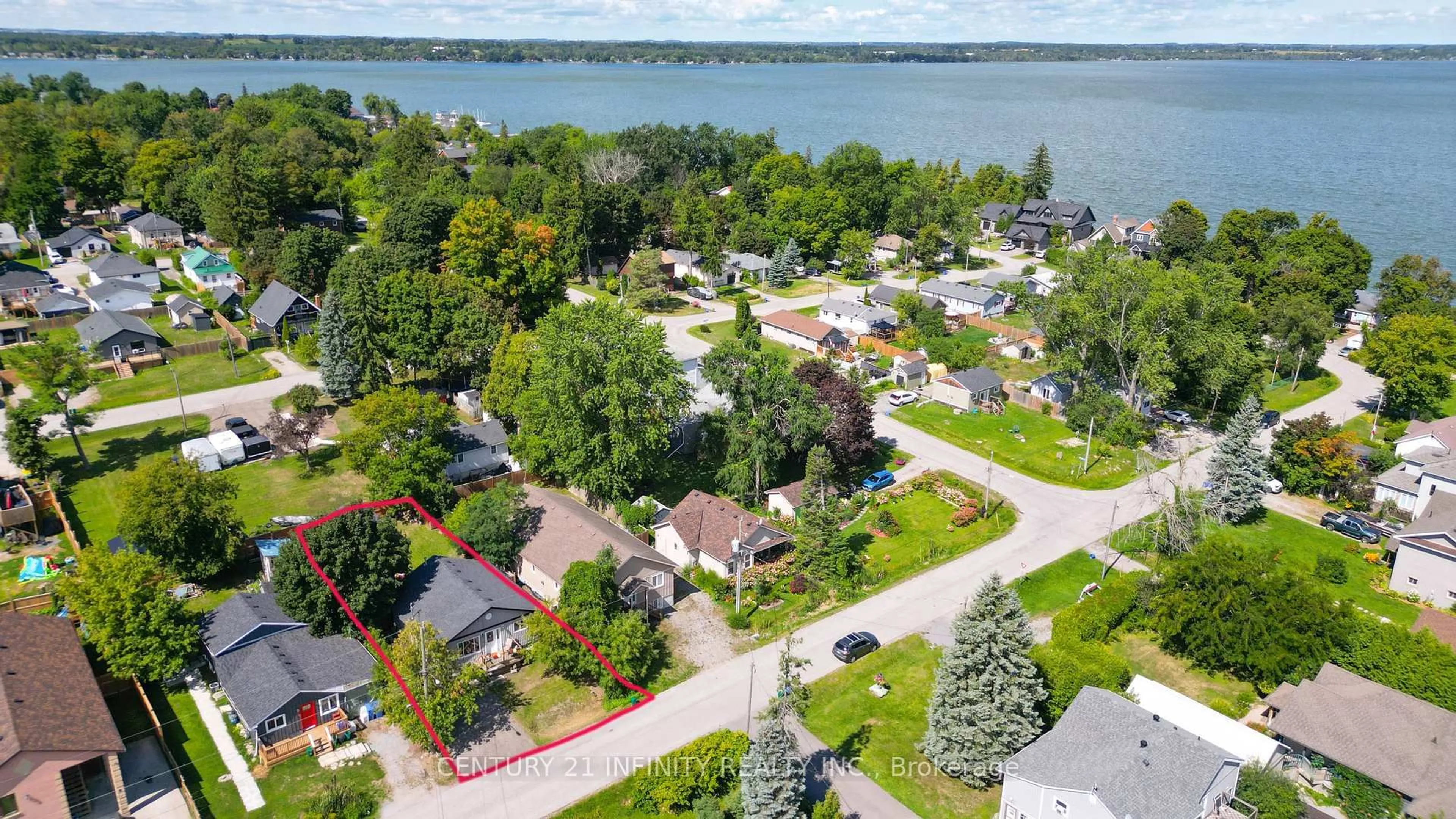 A pic from outside/outdoor area/front of a property/back of a property/a pic from drone, water/lake/river/ocean view for 16 Park St, Scugog Ontario L0B 1E0