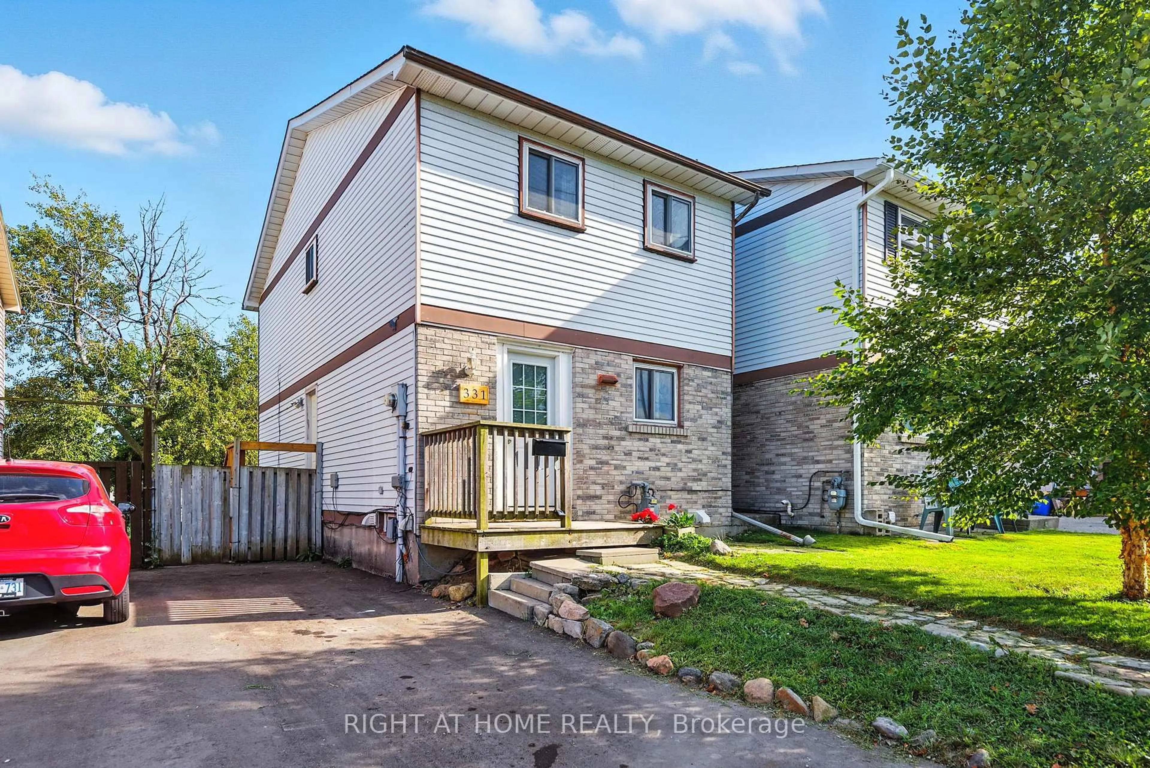 Home with vinyl exterior material, street for 331 Phillip Murray Ave, Oshawa Ontario L1J 1H1