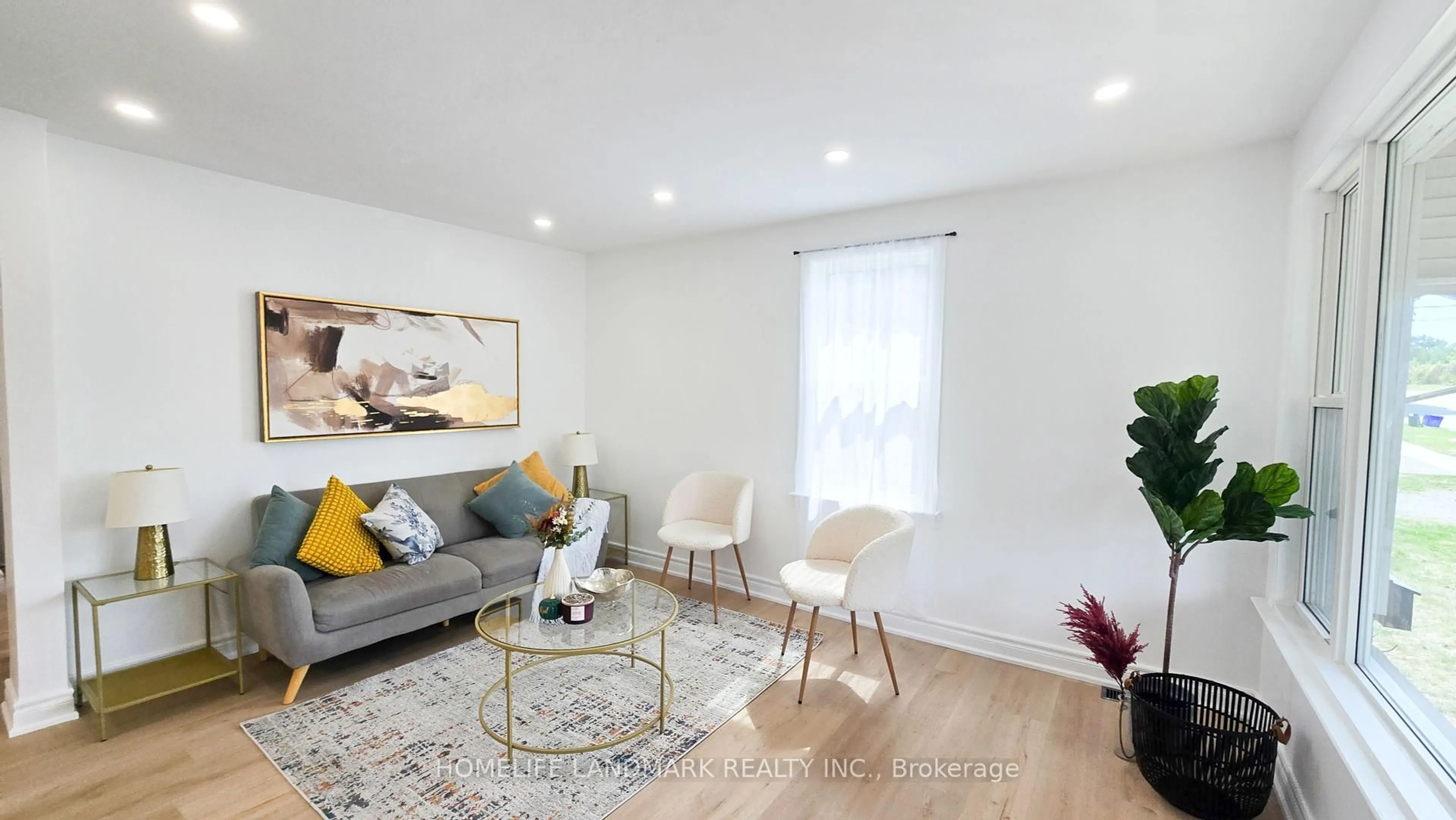 Living room with furniture, wood/laminate floor for 357 Oshawa Blvd, Oshawa Ontario L1G 5T2