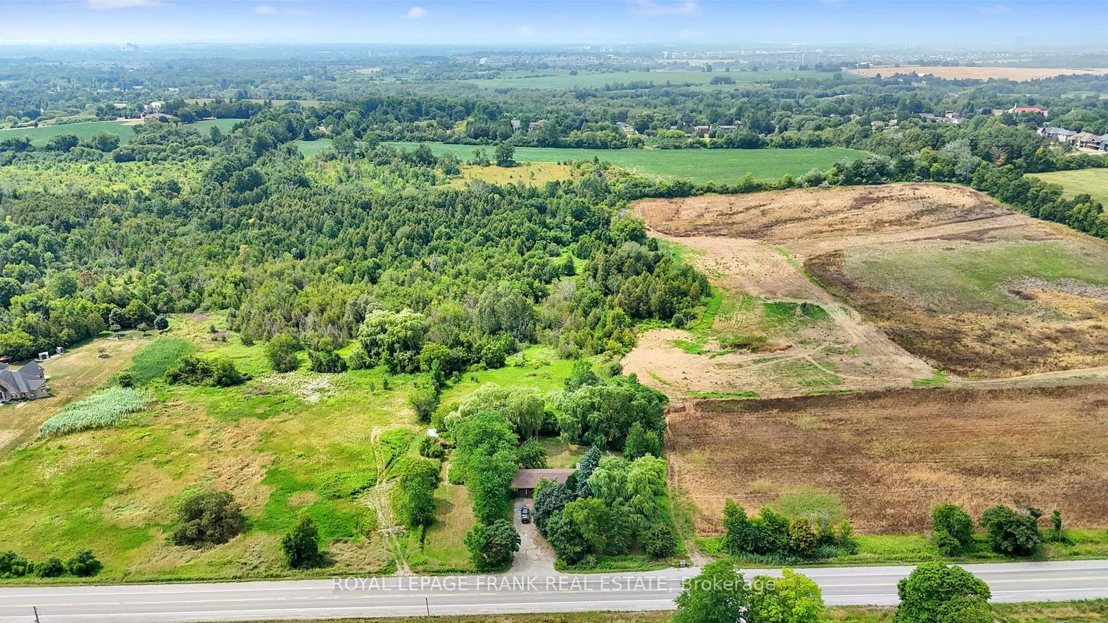 A pic from outside/outdoor area/front of a property/back of a property/a pic from drone, forest/trees view for 4538 Courtice Rd, Clarington Ontario L0B 1J0