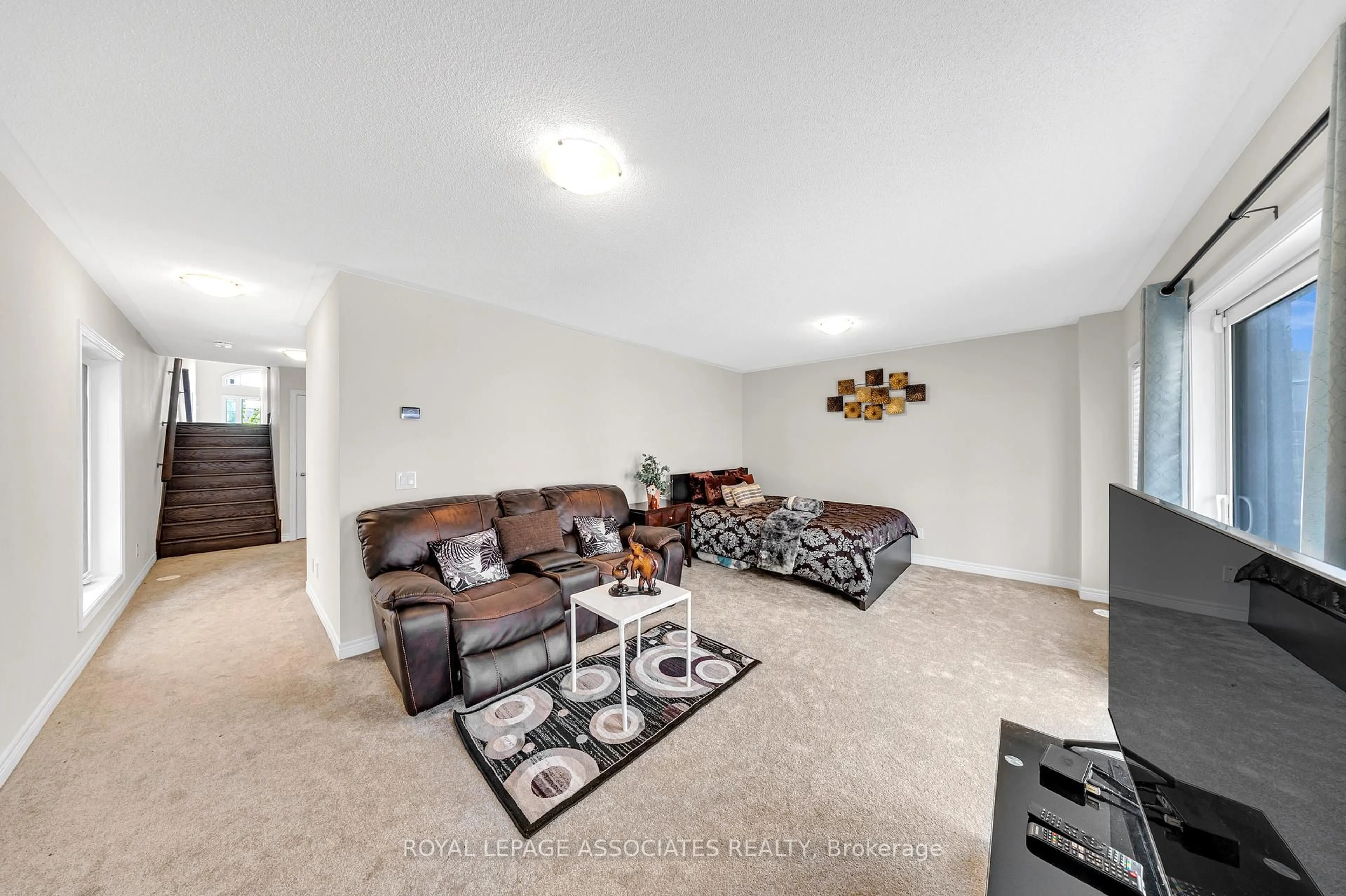Living room with furniture, carpet floor for 44 Elkington Cres, Whitby Ontario L1P 0L7