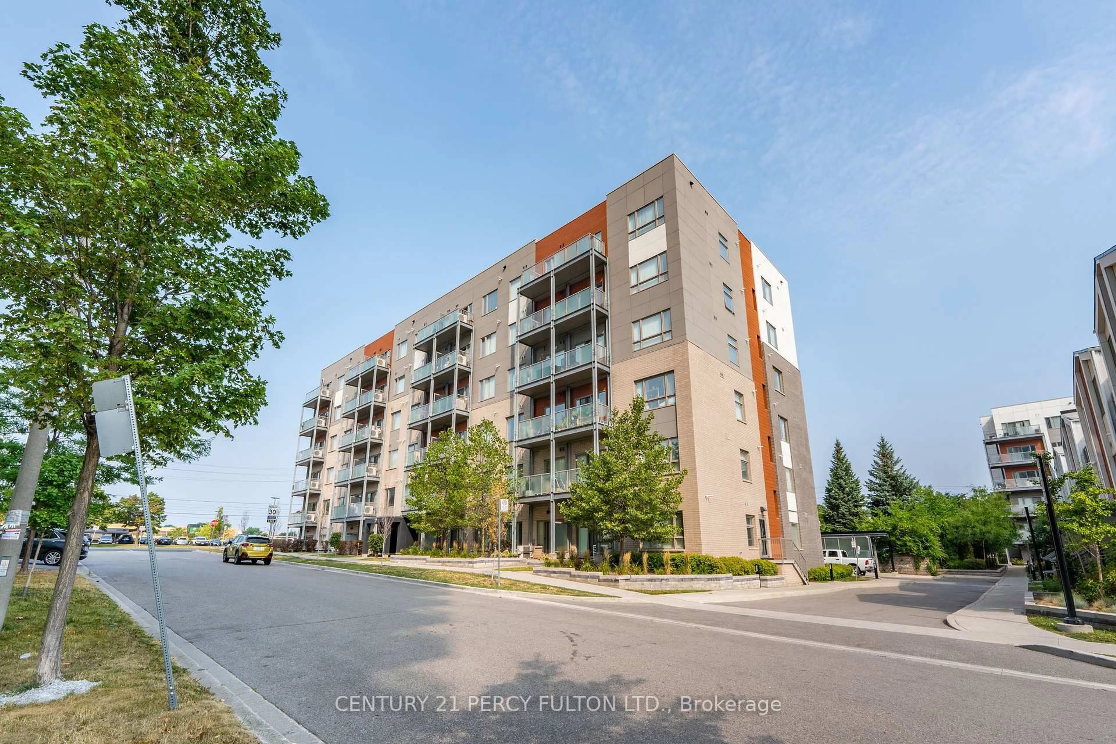 A pic from outside/outdoor area/front of a property/back of a property/a pic from drone, street for 20 Orchid Place Dr #202, Toronto Ontario M1B 0E1
