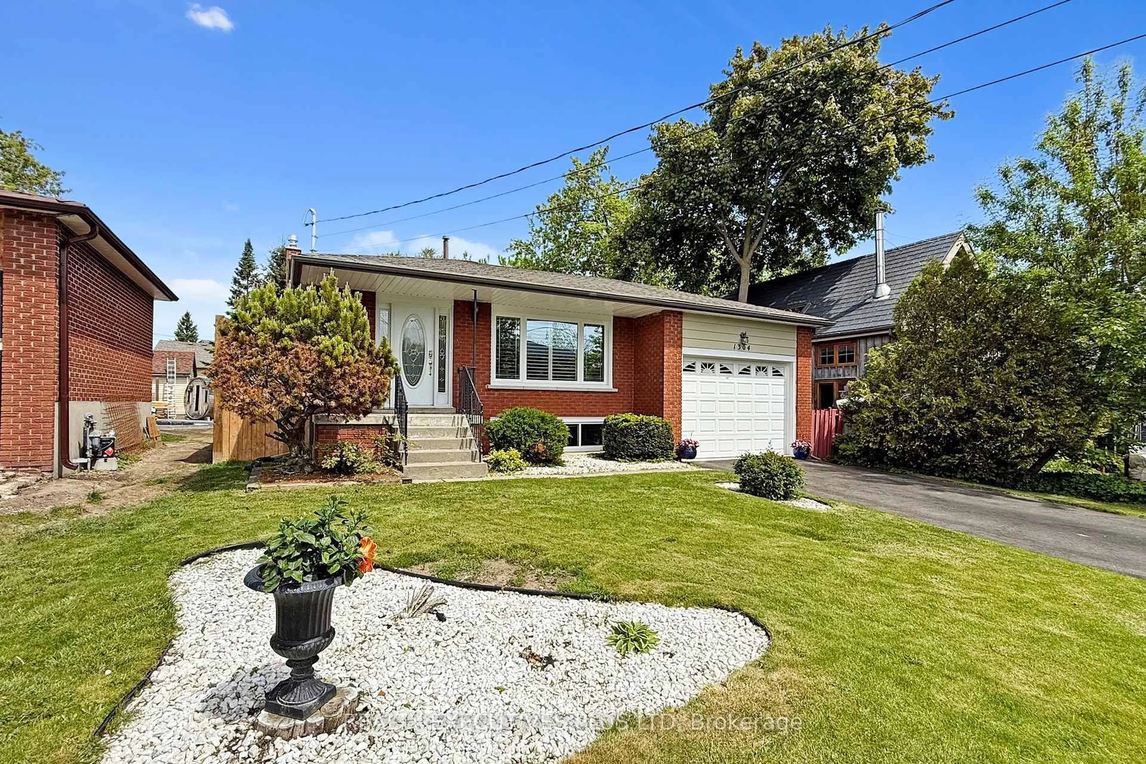 Home with brick exterior material, street for 1304 Wharf St, Pickering Ontario L1W 1A4
