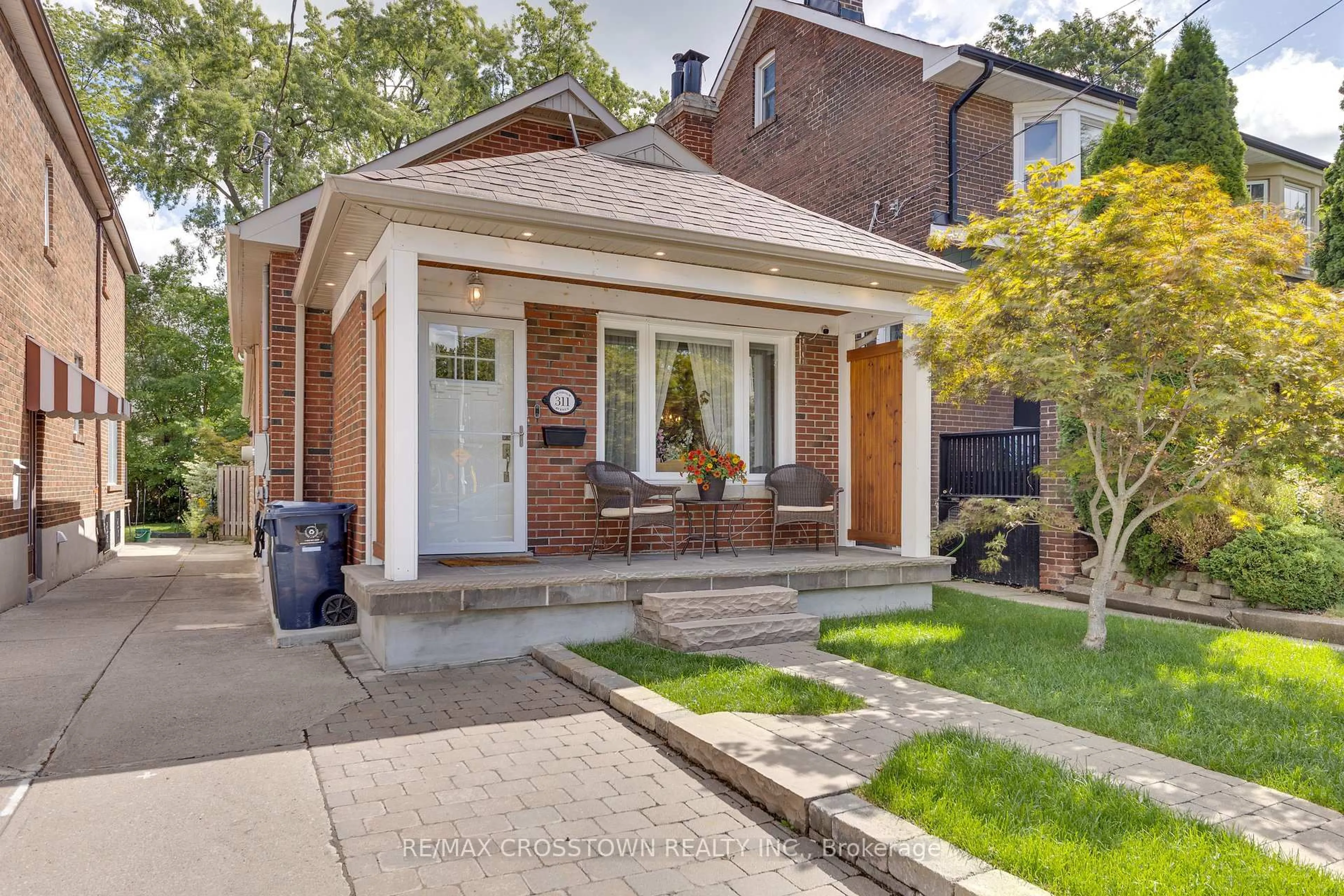 Home with brick exterior material, street for 311 Chisholm Ave, Toronto Ontario M4C 4W5