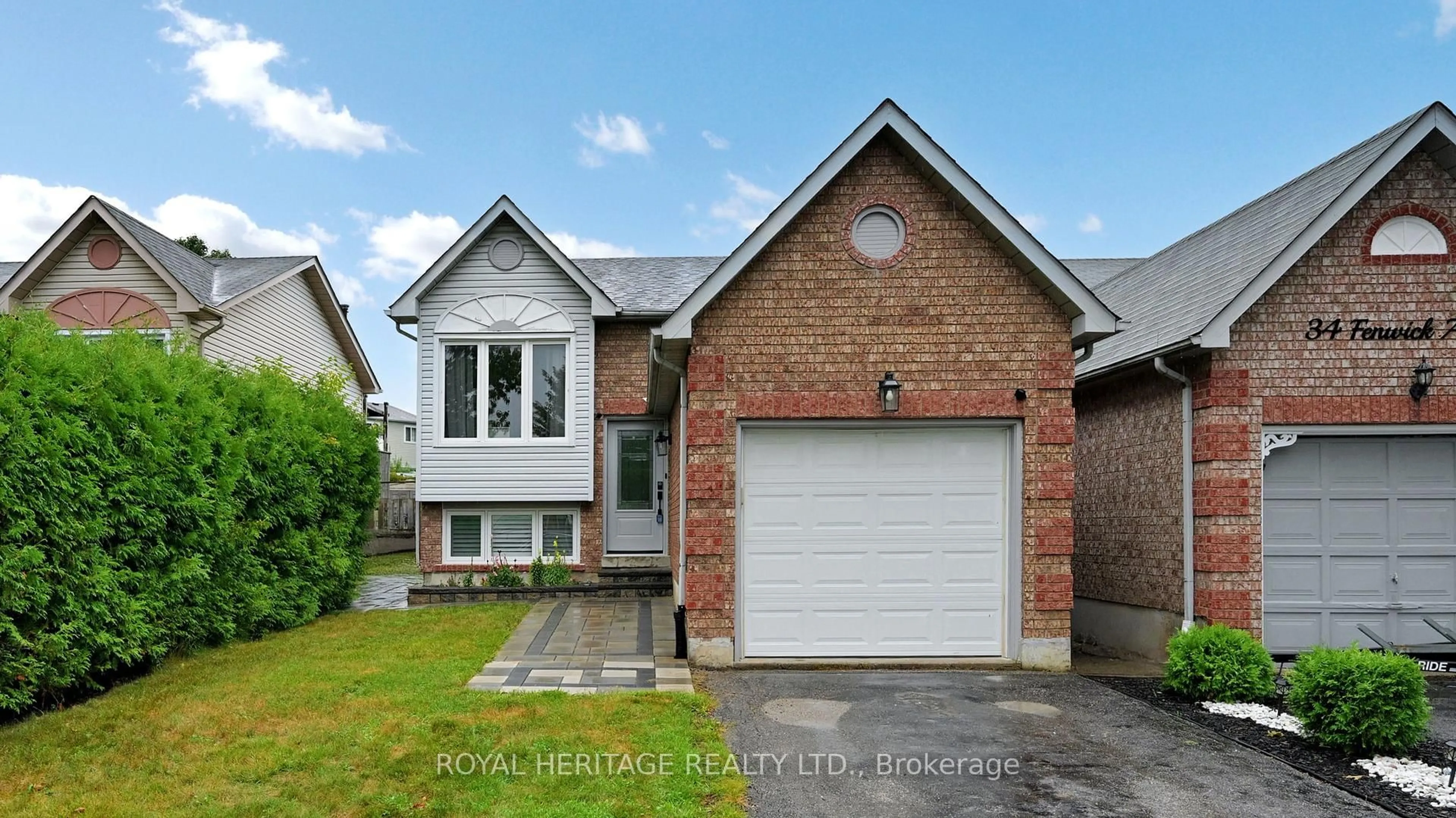 Home with brick exterior material, street for 32 Fenwick Ave, Clarington Ontario L1C 4R6