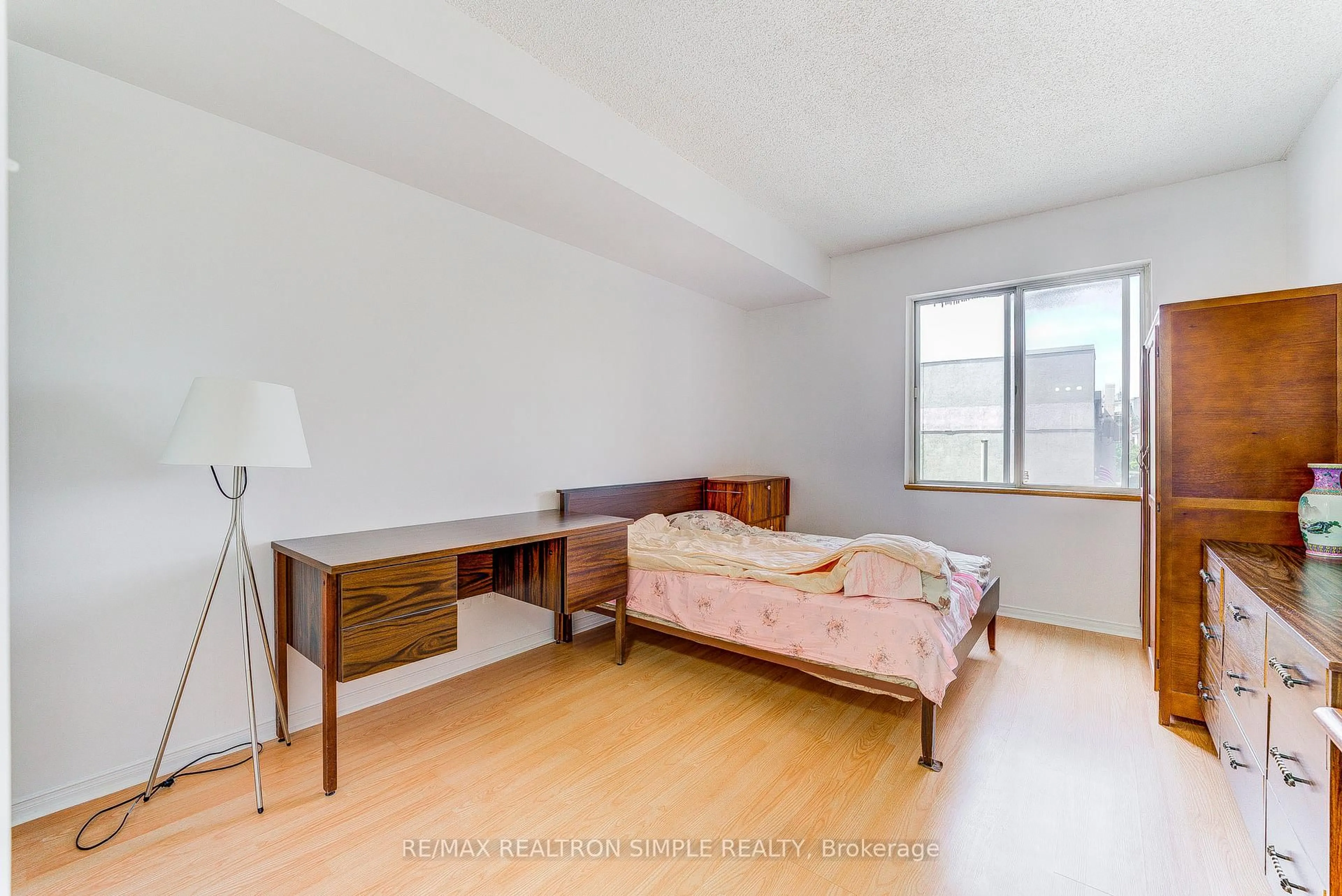 Bedroom with bed, unknown for 5800 Sheppard Ave #202, Toronto Ontario M1B 5J7