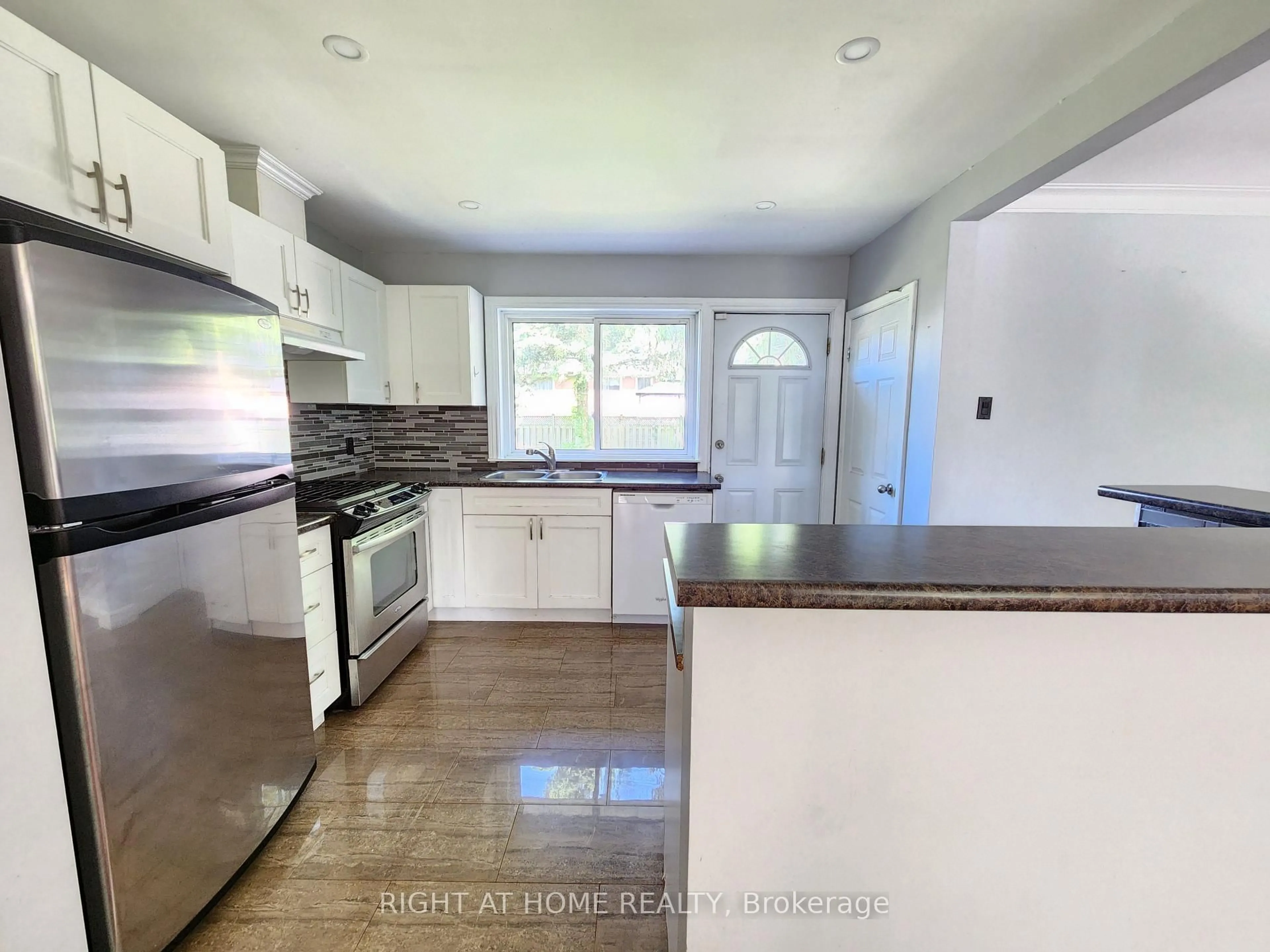Open concept kitchen, ceramic/tile floor for 332 Viewmount St, Oshawa Ontario L1H 7C3