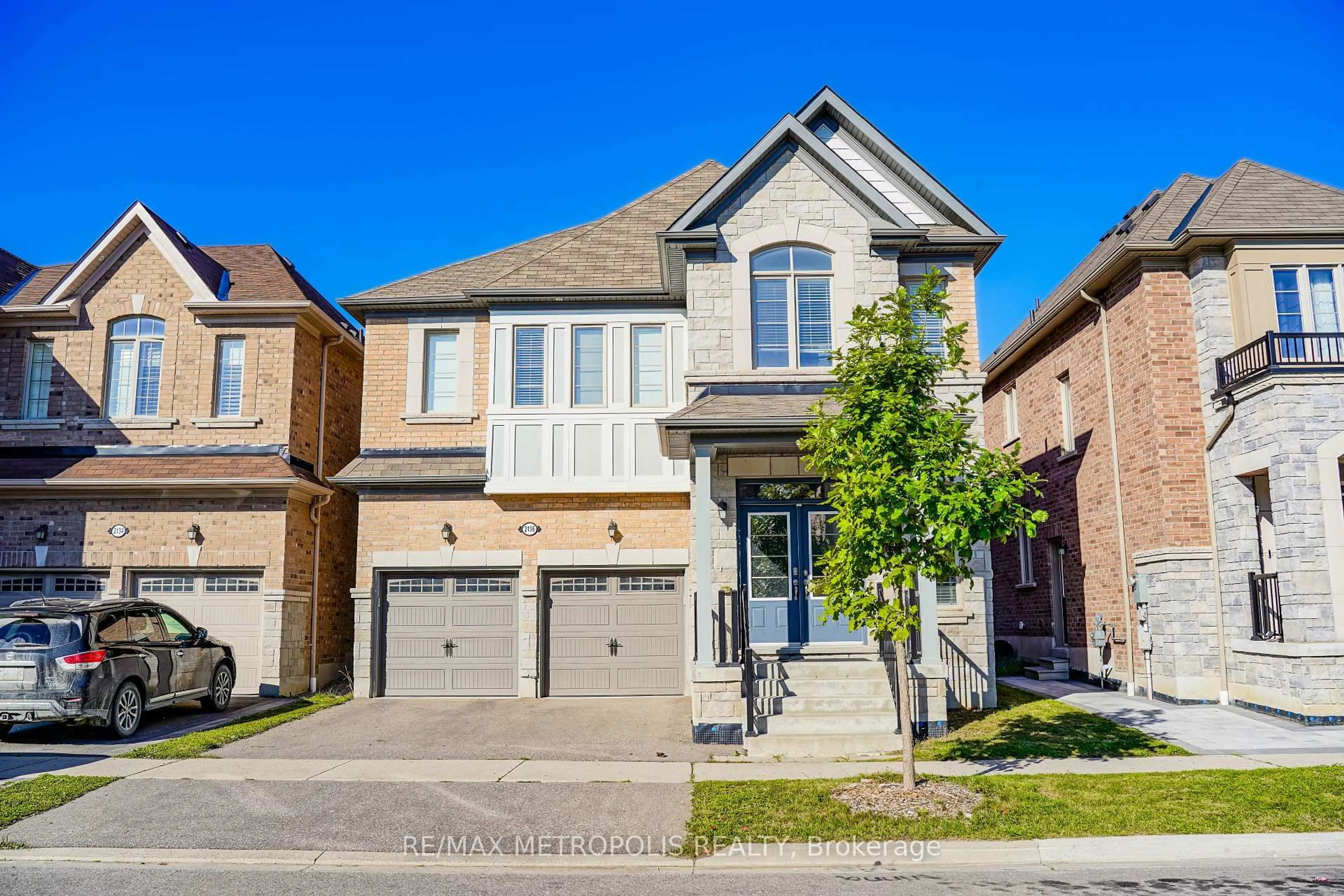 Home with brick exterior material, street for 2136 Saffron Dr, Pickering Ontario L1X 0E2