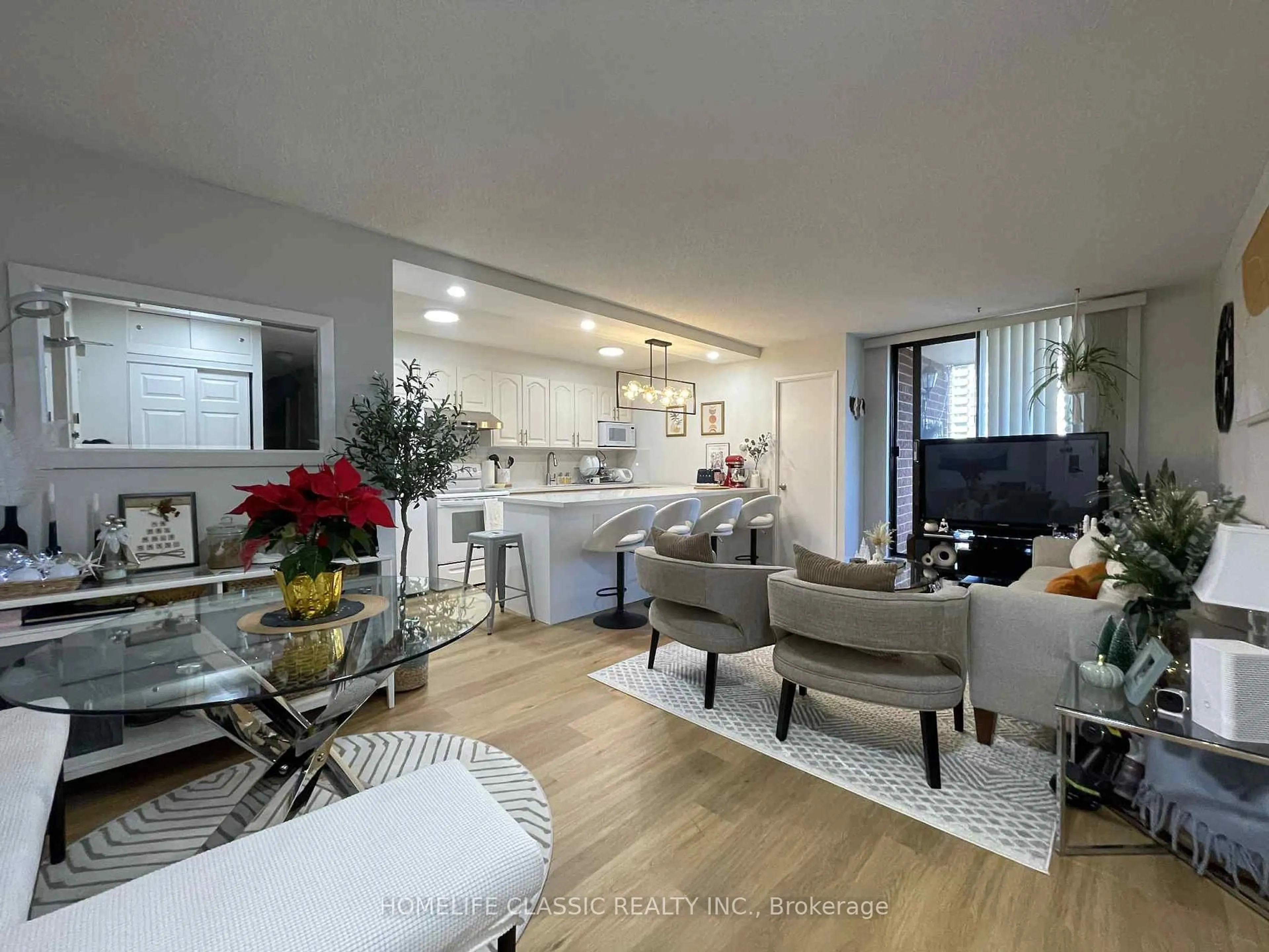 Living room with furniture, unknown for 90 Ling Rd #603, Toronto Ontario M1E 4Y3