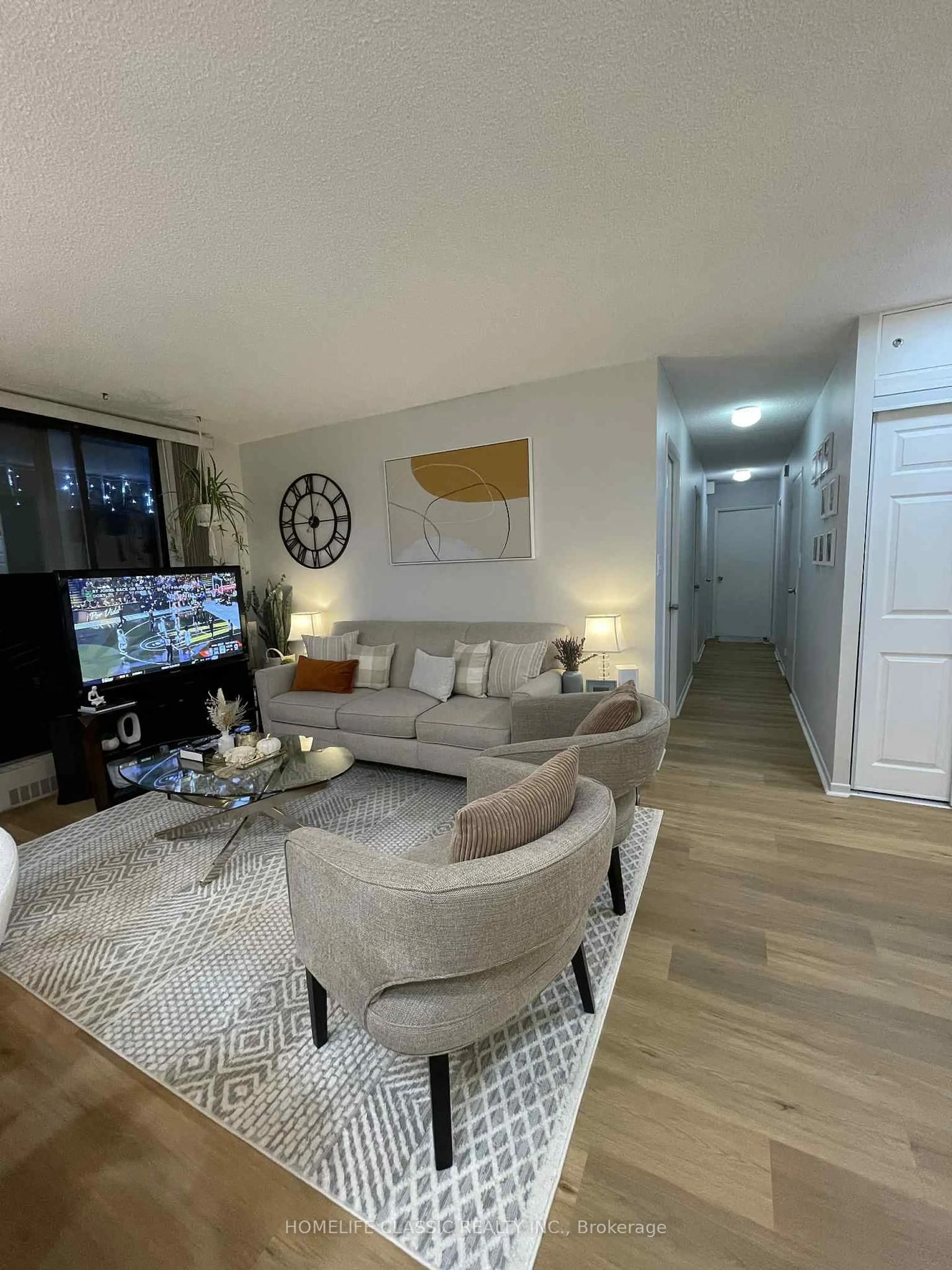 Living room with furniture, unknown for 90 Ling Rd #603, Toronto Ontario M1E 4Y3