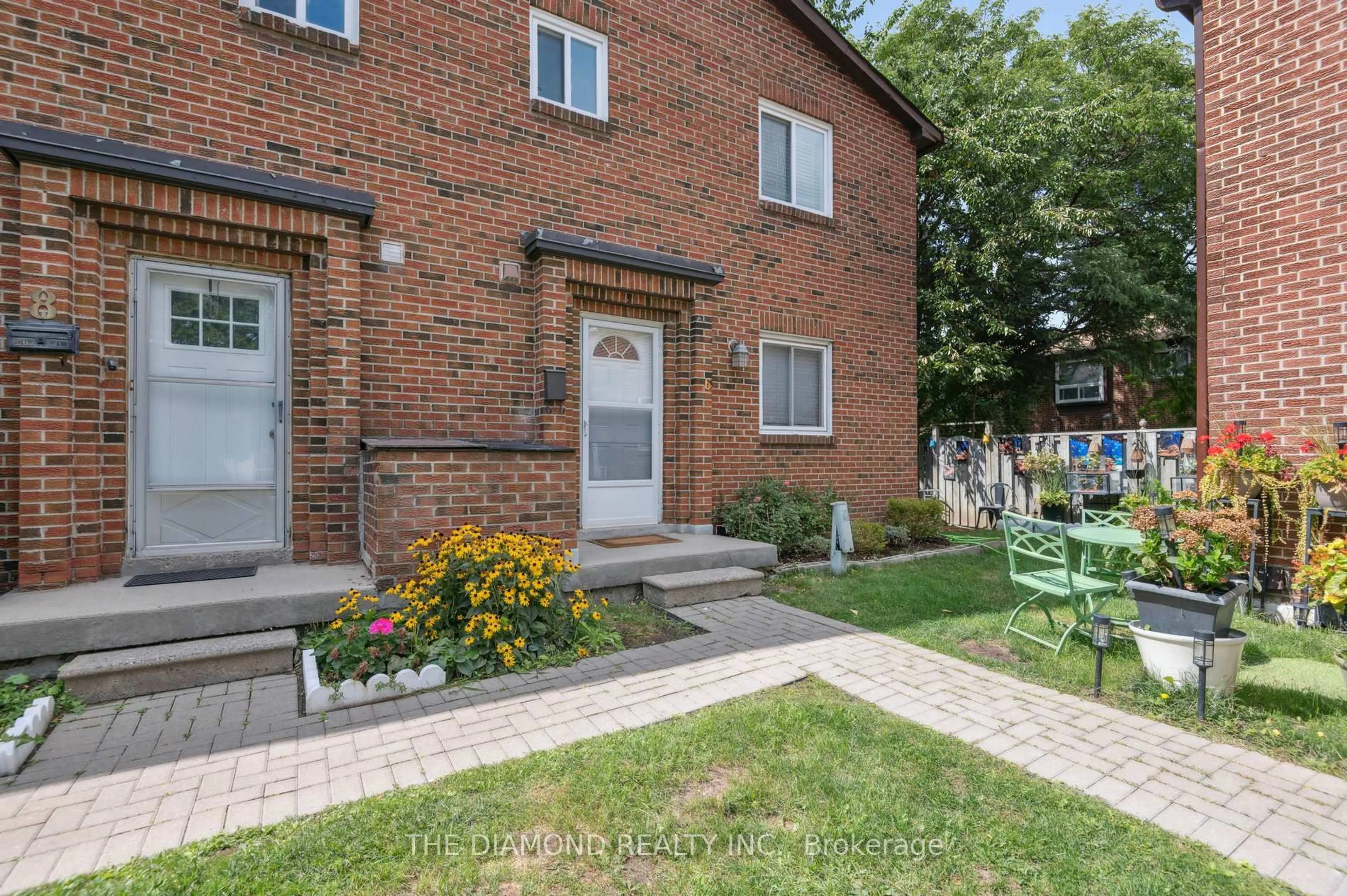 Home with brick exterior material, street for 72 Dusay Pl #6, Toronto Ontario M1W 2N2