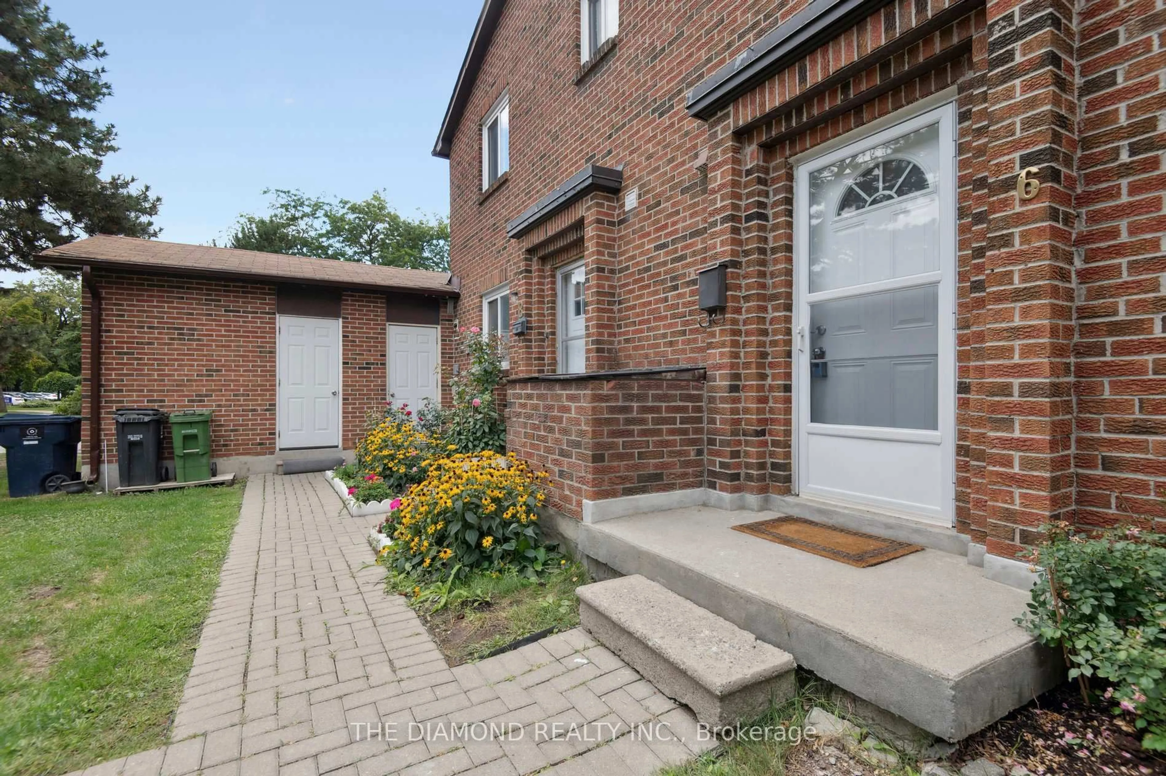 Home with brick exterior material, street for 72 Dusay Pl #6, Toronto Ontario M1W 2N2